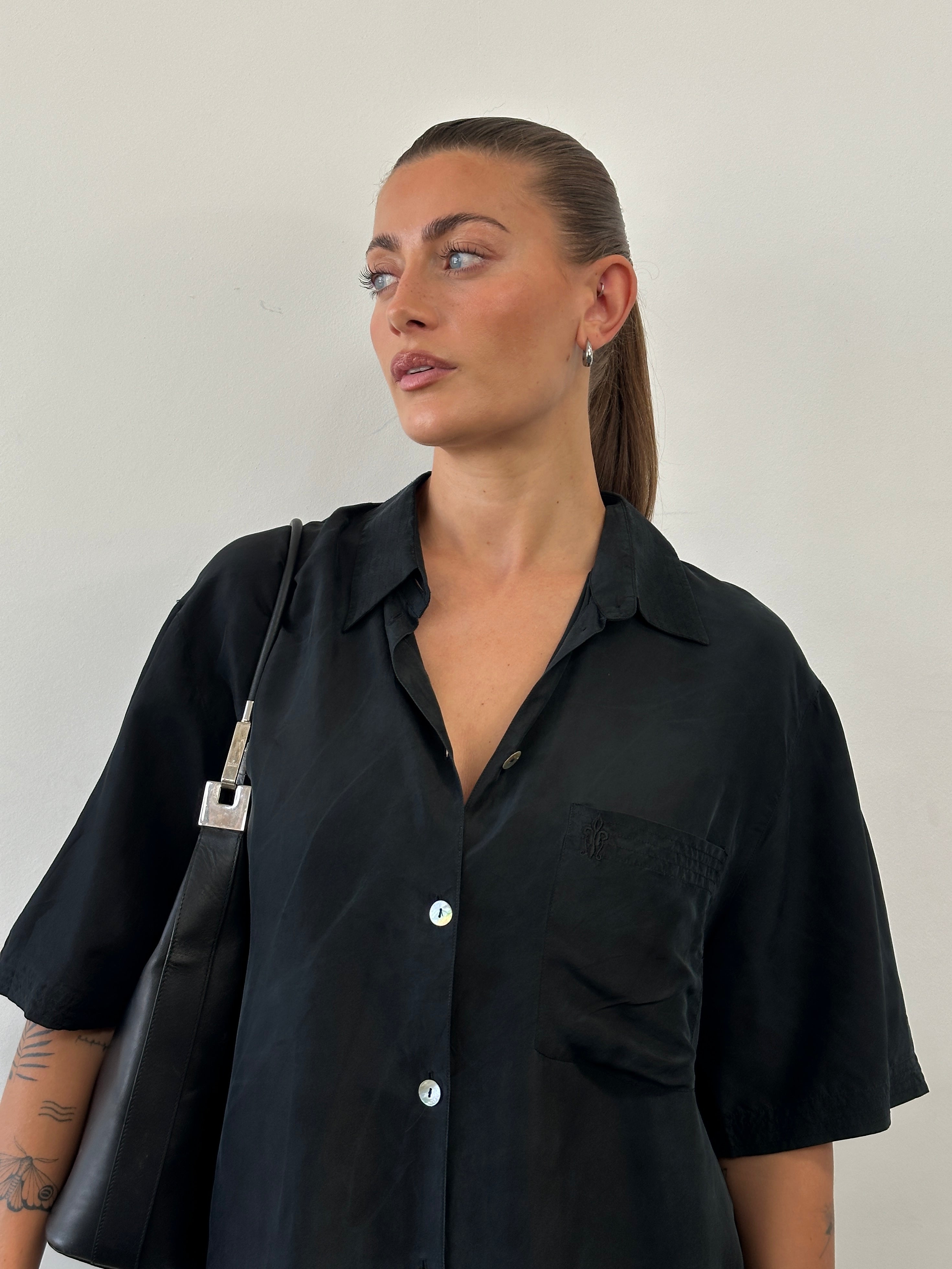 Vintage pure silk short sleeve shirt in size XL, lightweight and smooth fabric with a classic collar and button closure.