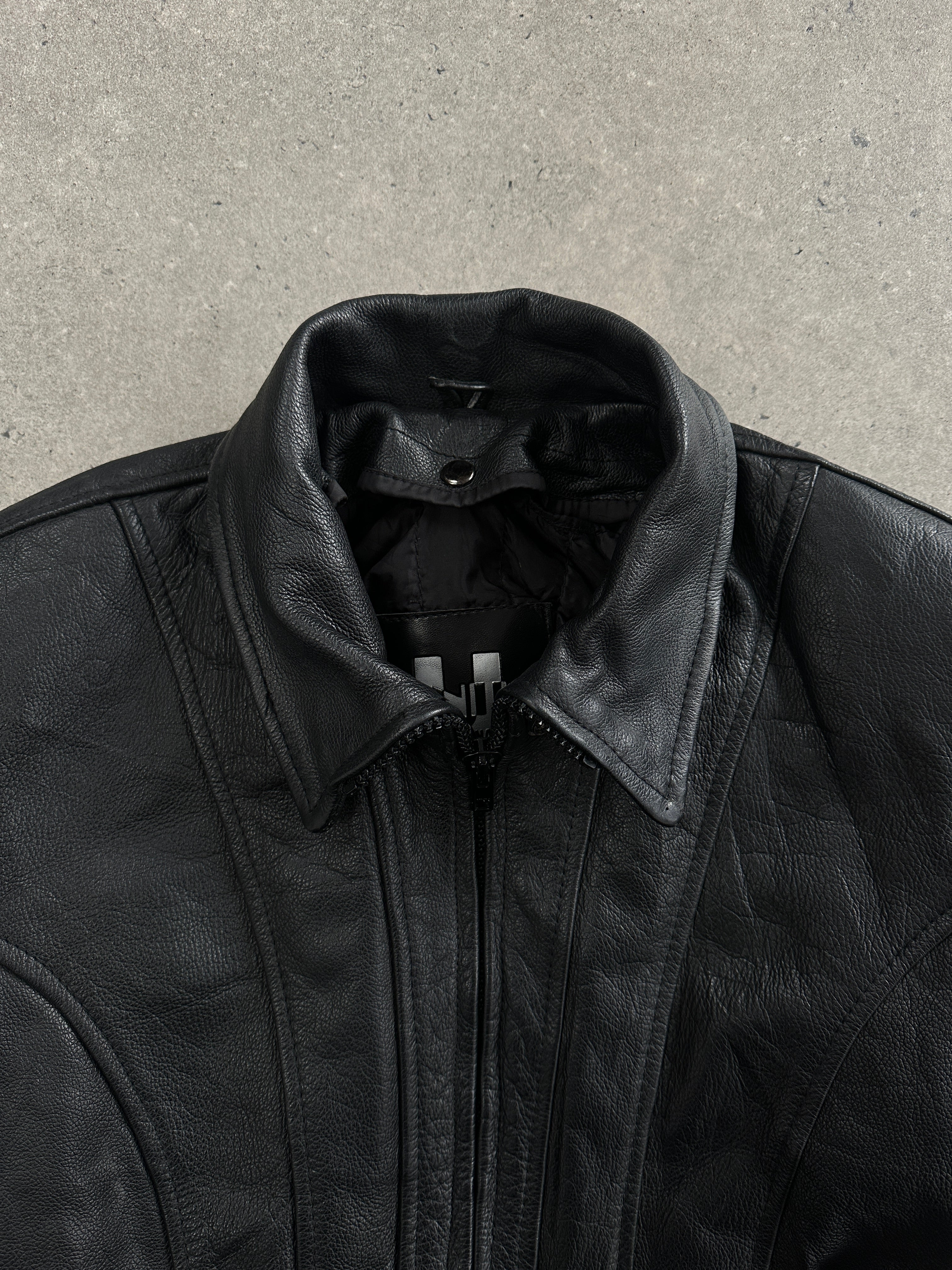 Vintage 1990s high neck belted leather jacket, size M, featuring classic design and rich brown leather details.