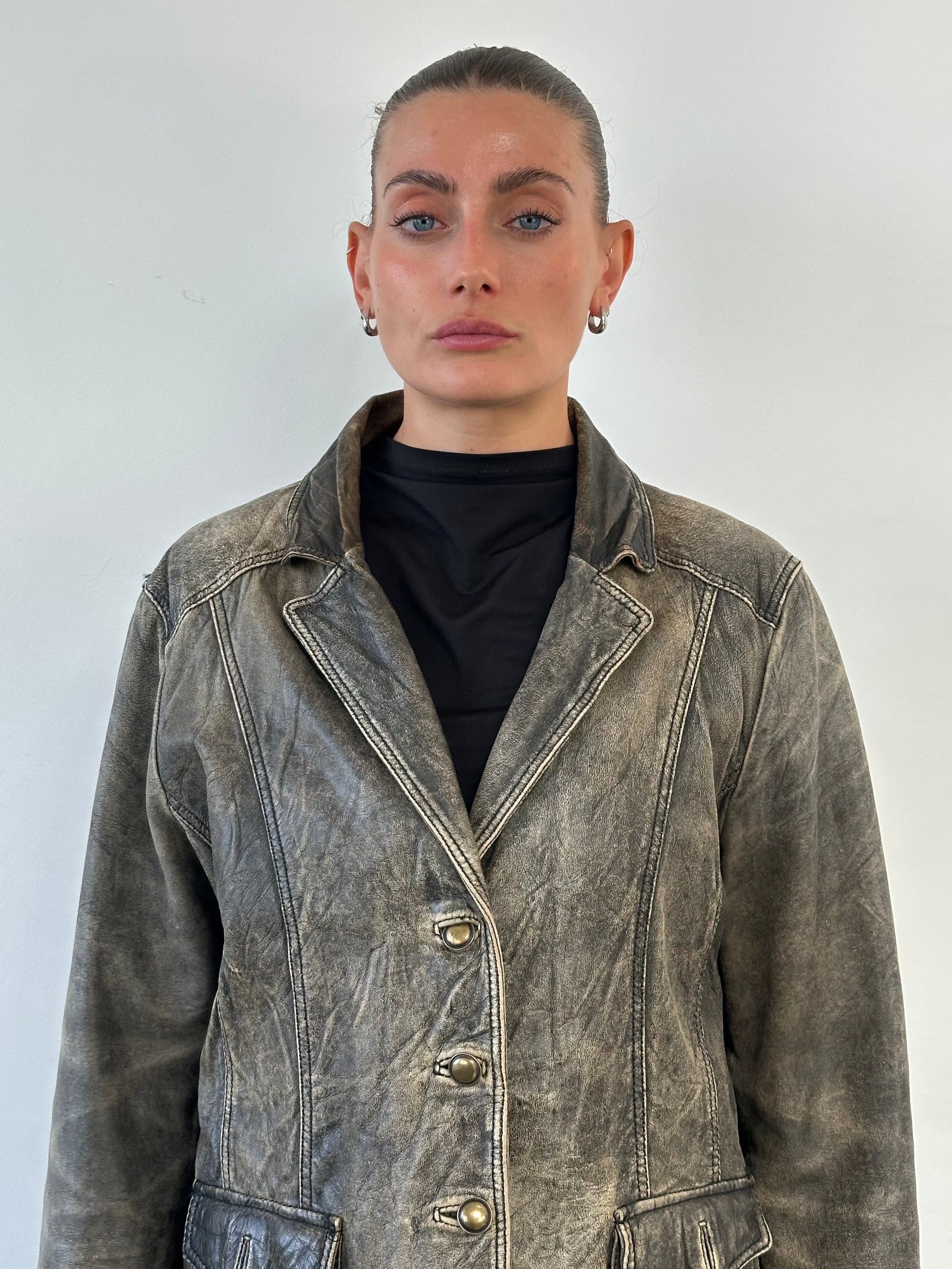 Vintage aged leather blazer jacket for men in size medium, showcasing distressed leather and classic tailored fit.