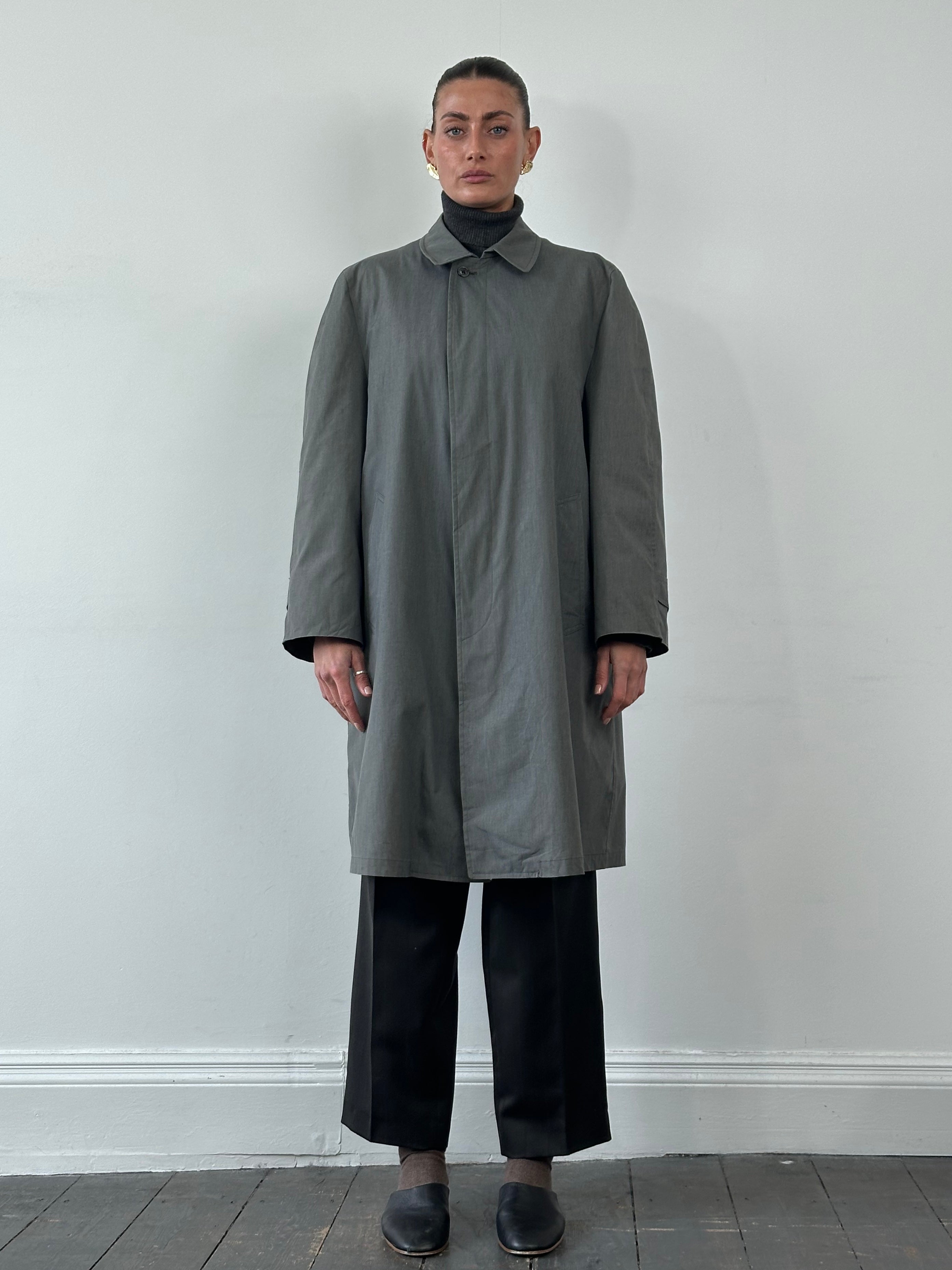 London Fog XL trench coat with concealed placket, stylish and classic outerwear for versatile weather protection.