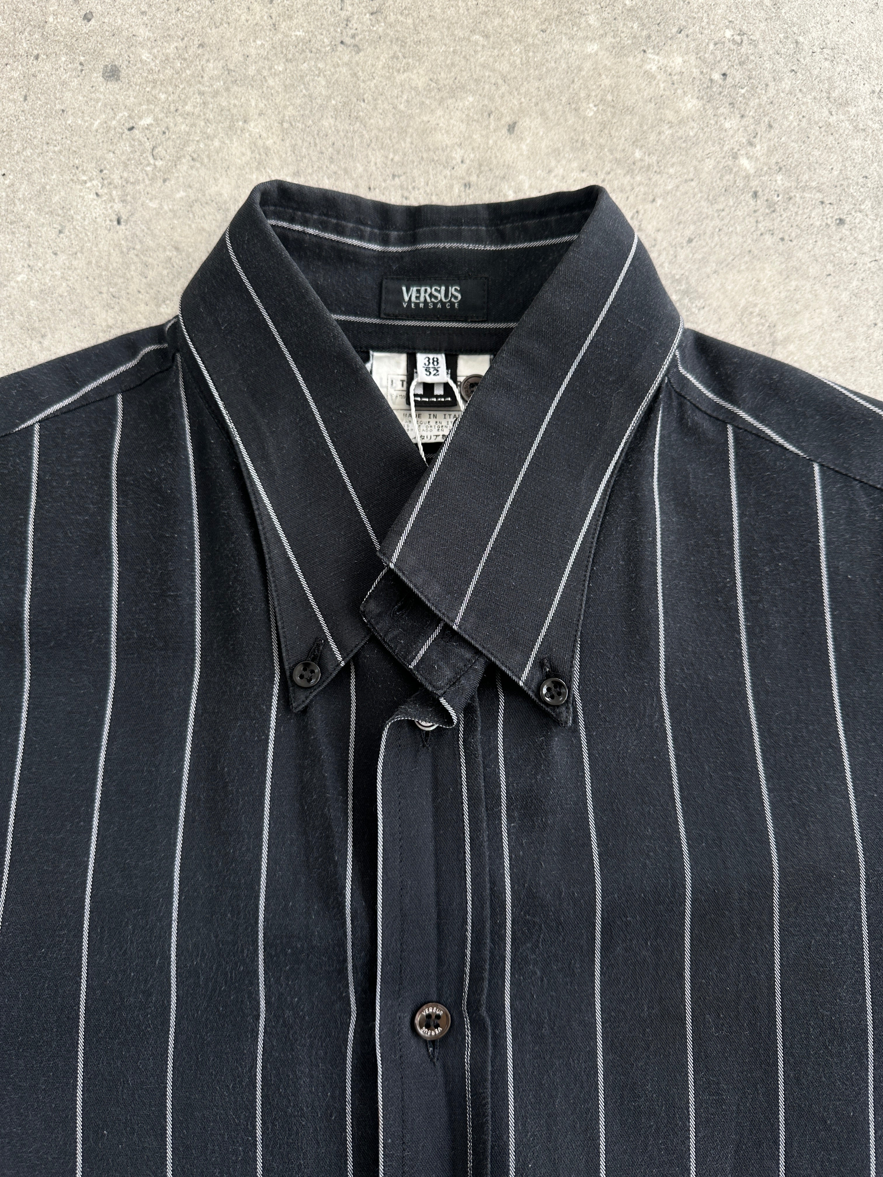 Versace Versus 2000s striped cotton shirt in size M/L, featuring bold colorful stripes and classic button-up design.