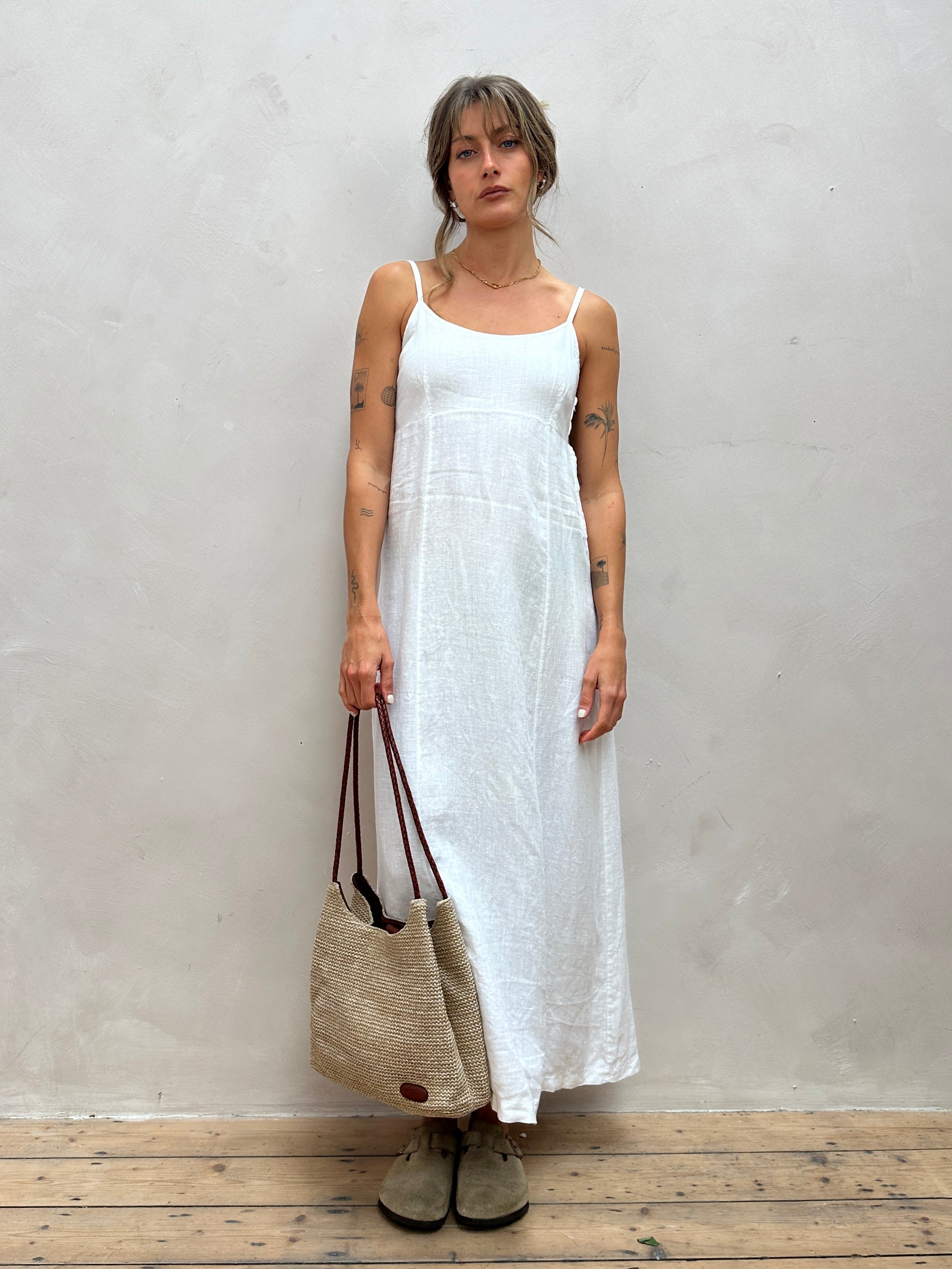 Vintage Italian vintage pure linen floor-length slip dress in S/M size, featuring a classic elegant design and flowing fabric.