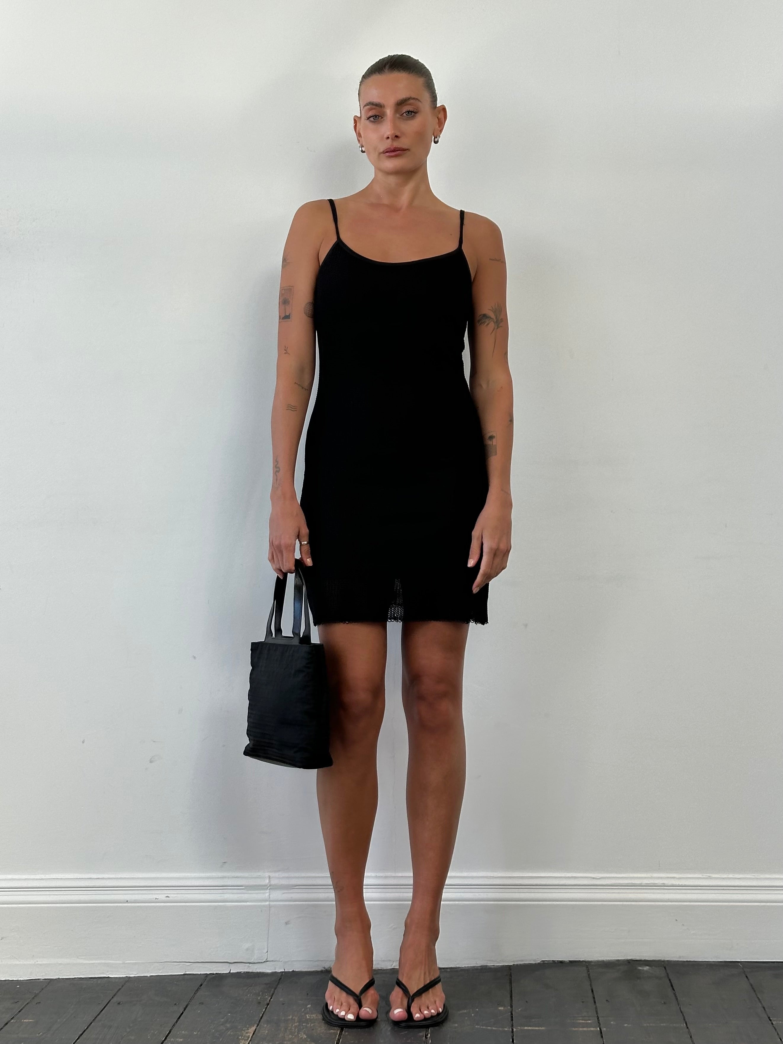Vintage French vintage double layered mini slip dress, size small, showing its elegant layered design and soft fabric.