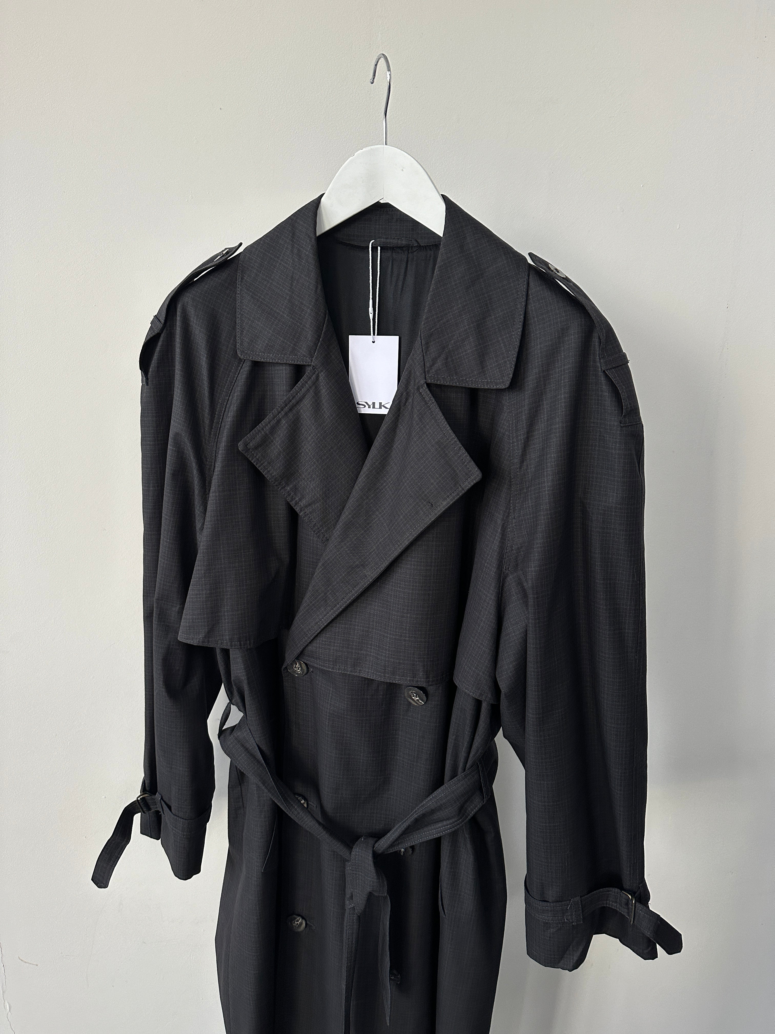 Christian Dior cotton double-breasted belted trench coat in XL, showcasing classic design with wide lapels and belt at waist.