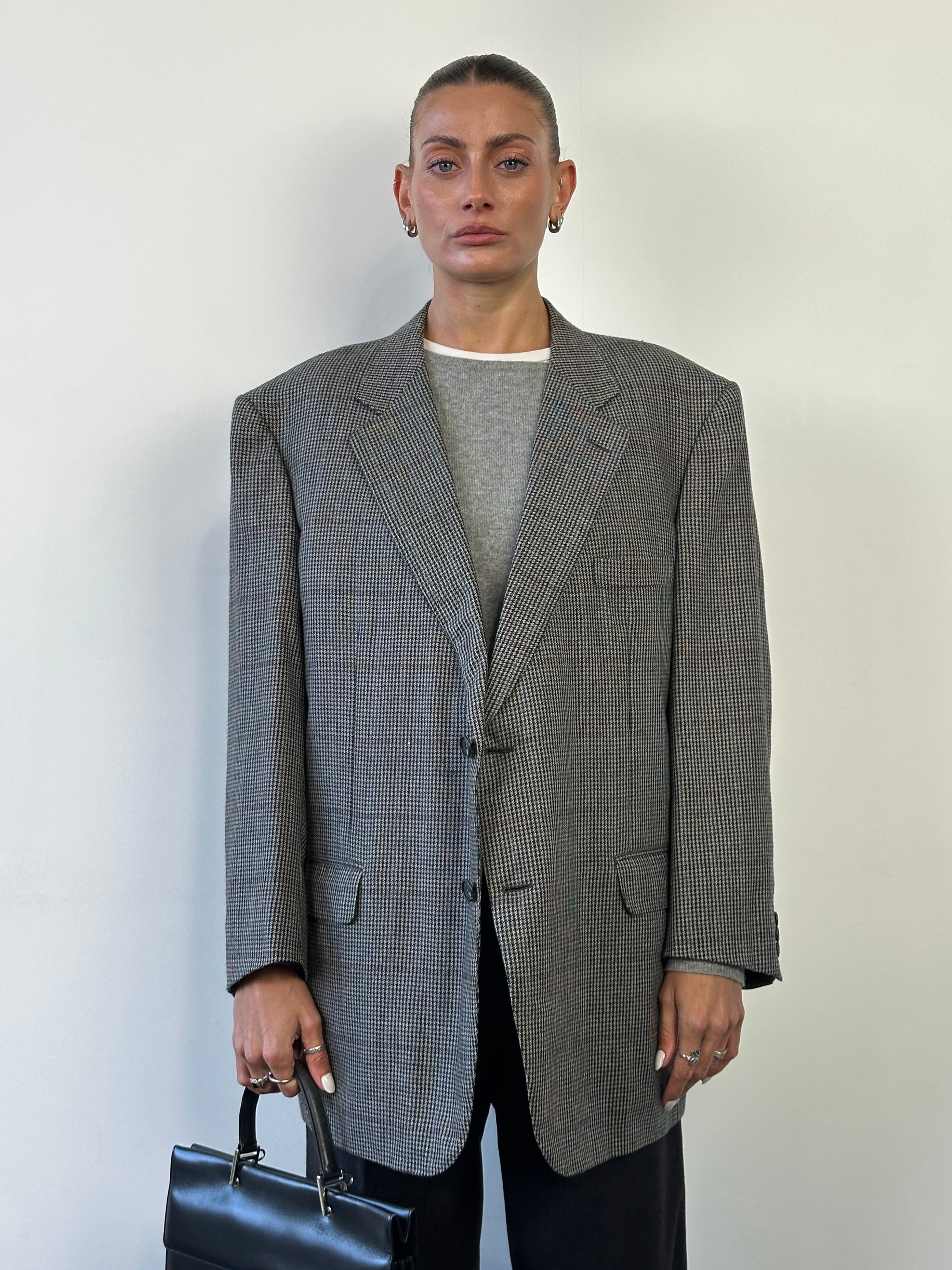 Christian Dior Monsieur wool dogtooth blazer in size 50R/XXL, single-breasted with notch lapels and tailored fit.