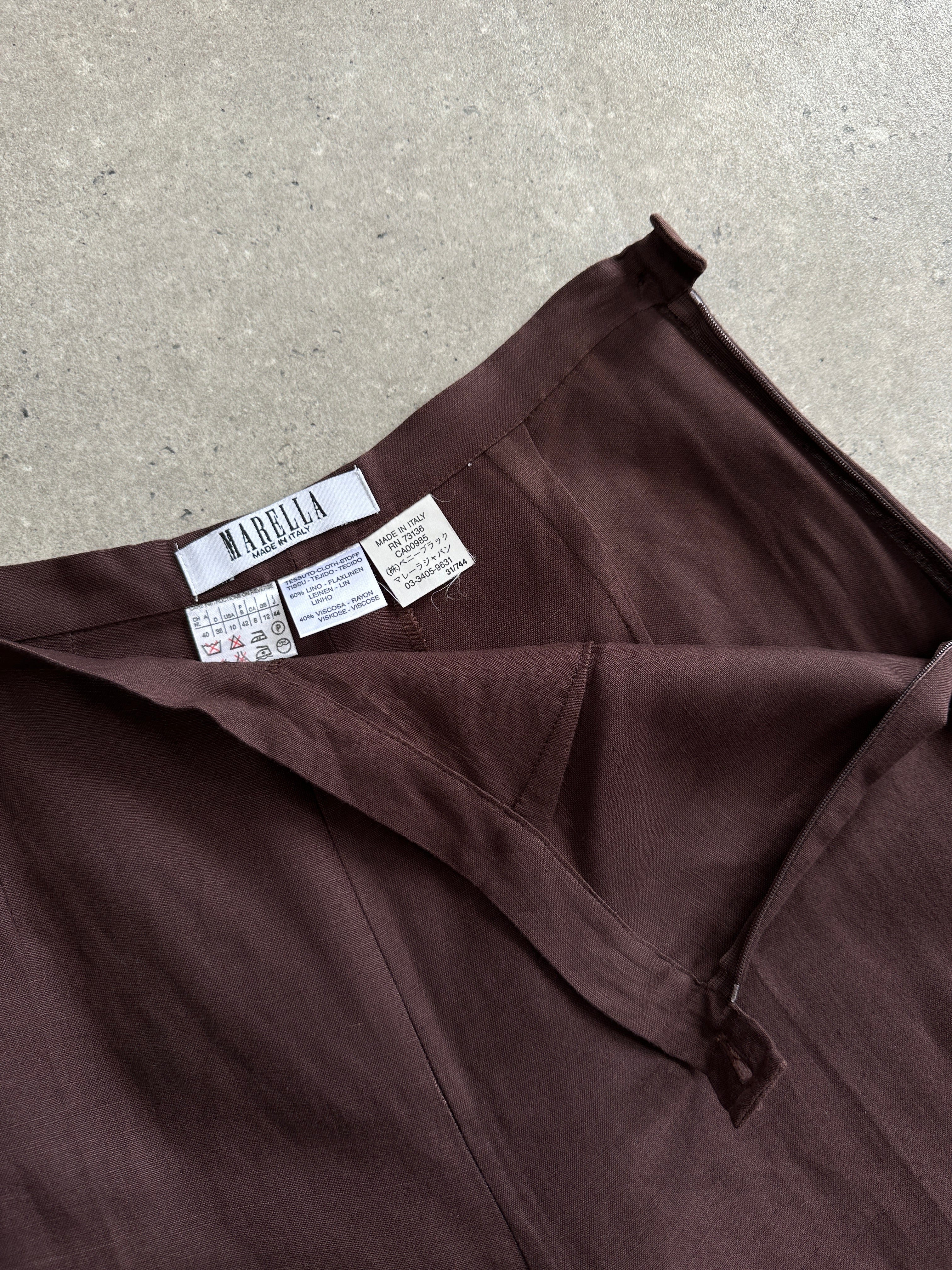 Marella linen high-waisted trousers in W26, featuring a relaxed fit and tailored design, shown on a neutral background.