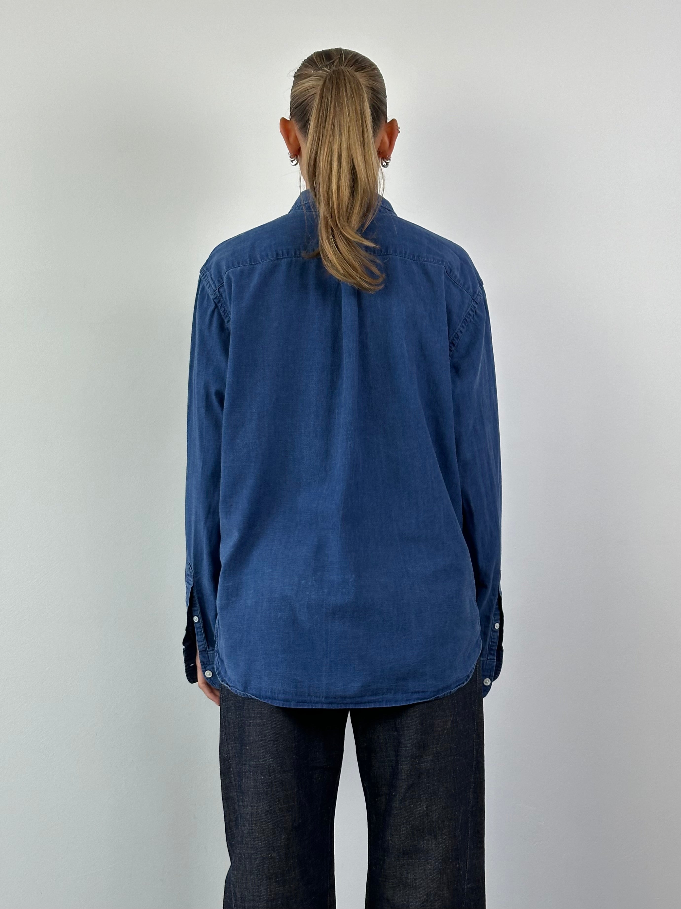 Levi’s Pure Cotton Denim Shirt in XL, showing long-sleeve design with button closure and classic denim texture.