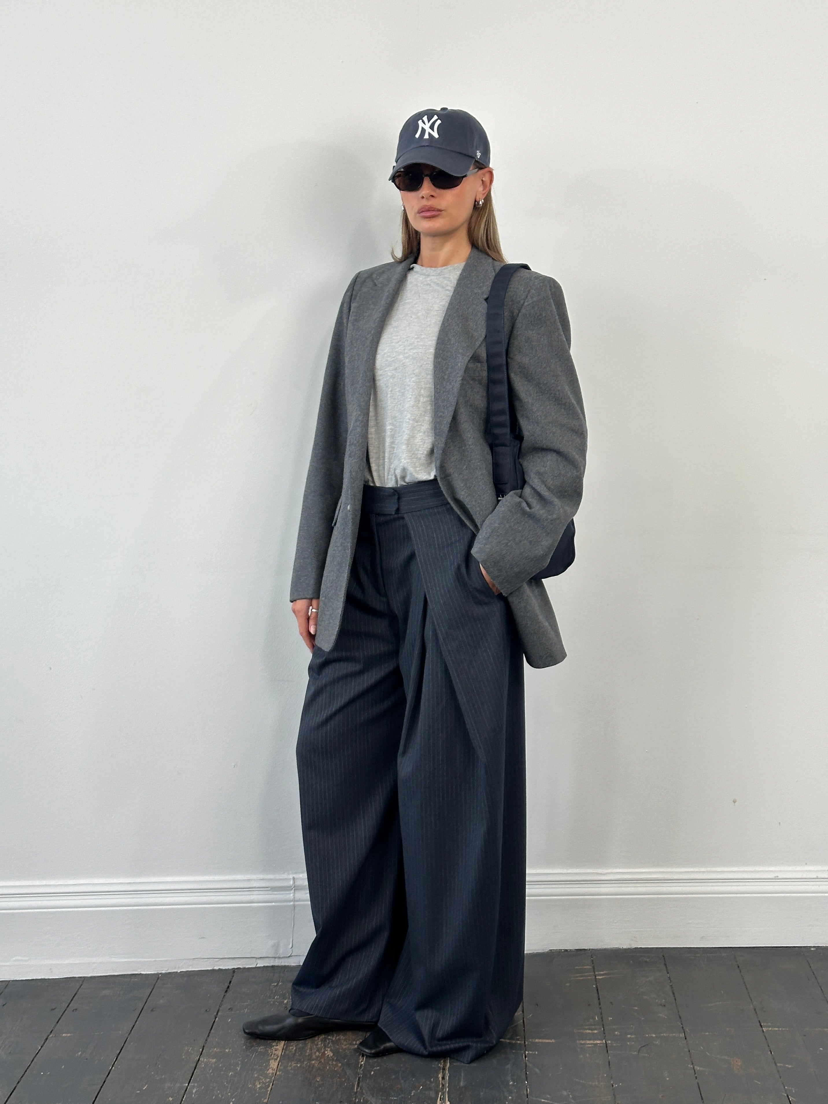 Yves Saint Laurent 1990s single-breasted brushed wool blazer in size 38R/L, shown on a hanger with classic lapel detail.