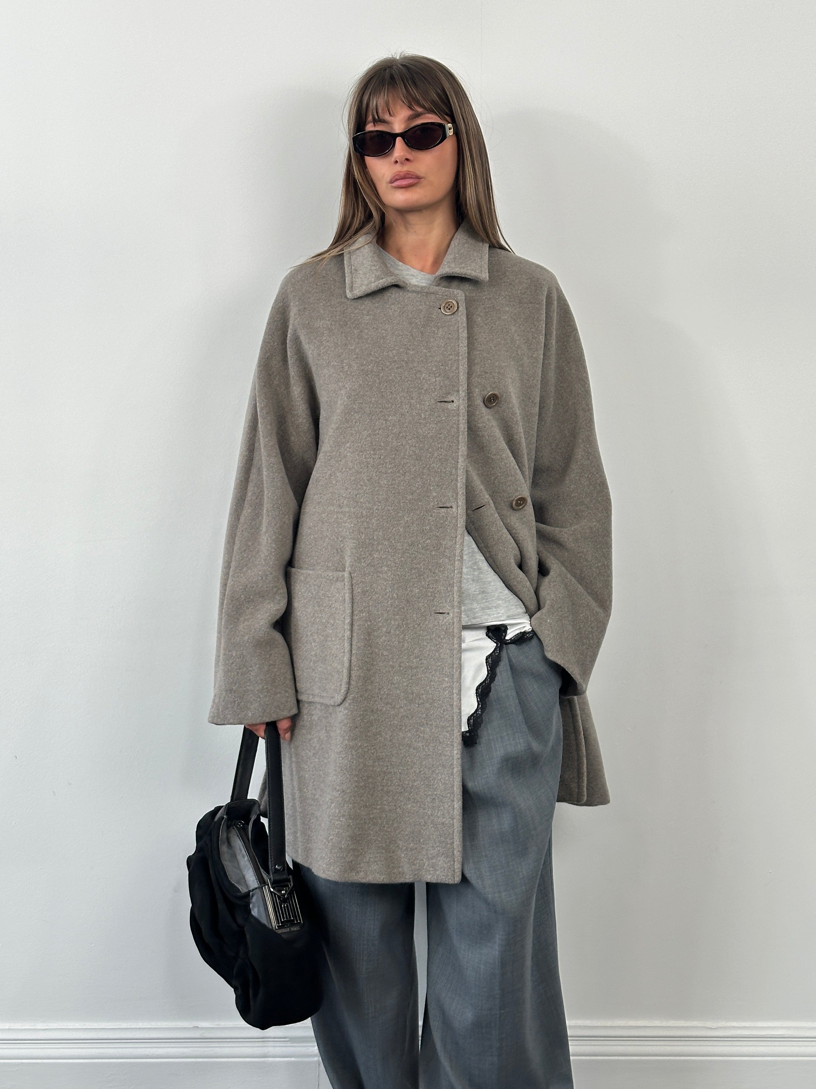 Marella 1990s virgin wool single-breasted coat in XL, shown on a hanger with classic lapels and tailored fit.