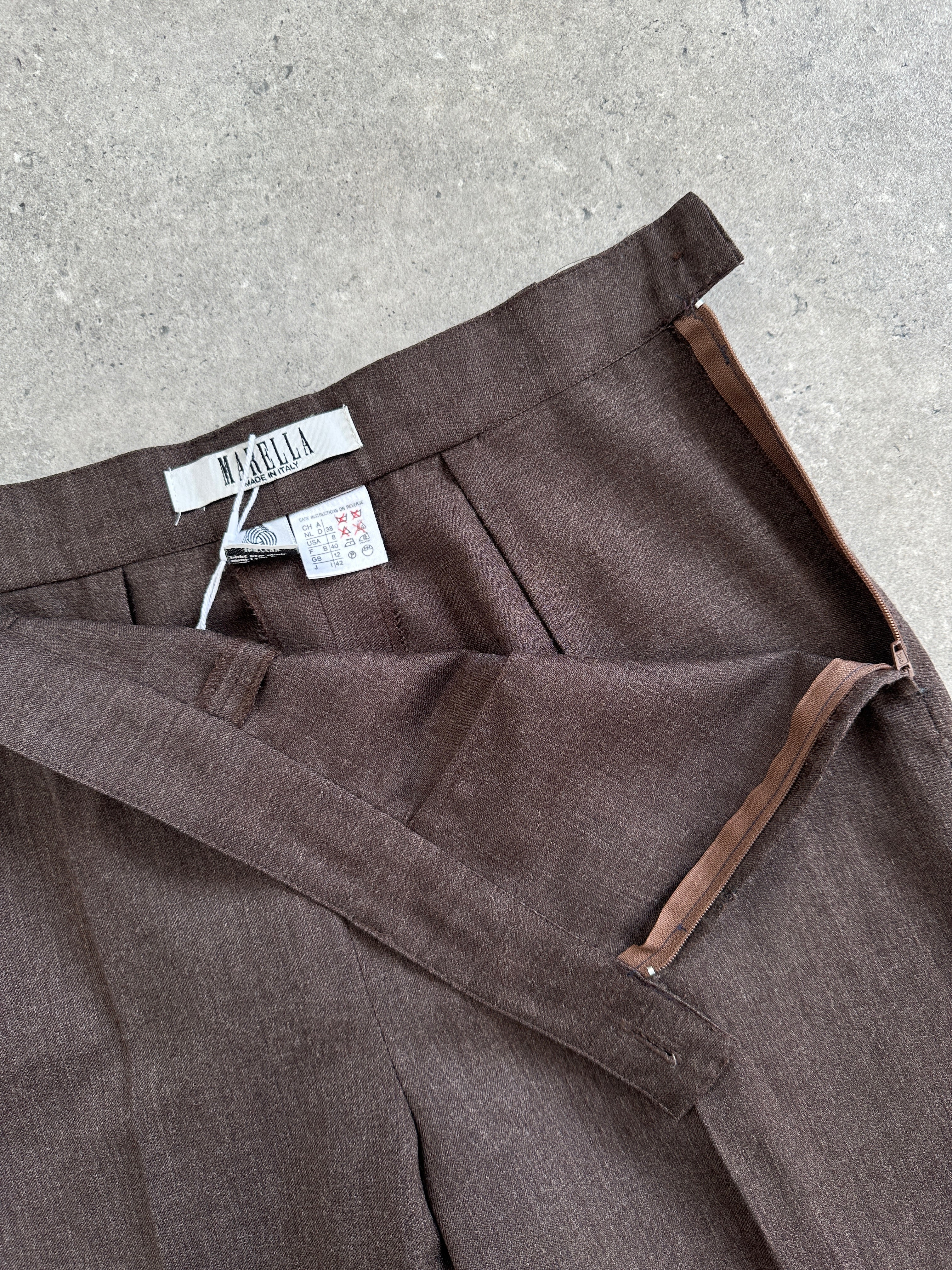 Marella 2000s high-waisted wool Bermuda shorts in tailored design, featuring a classic beige color and W26 size.