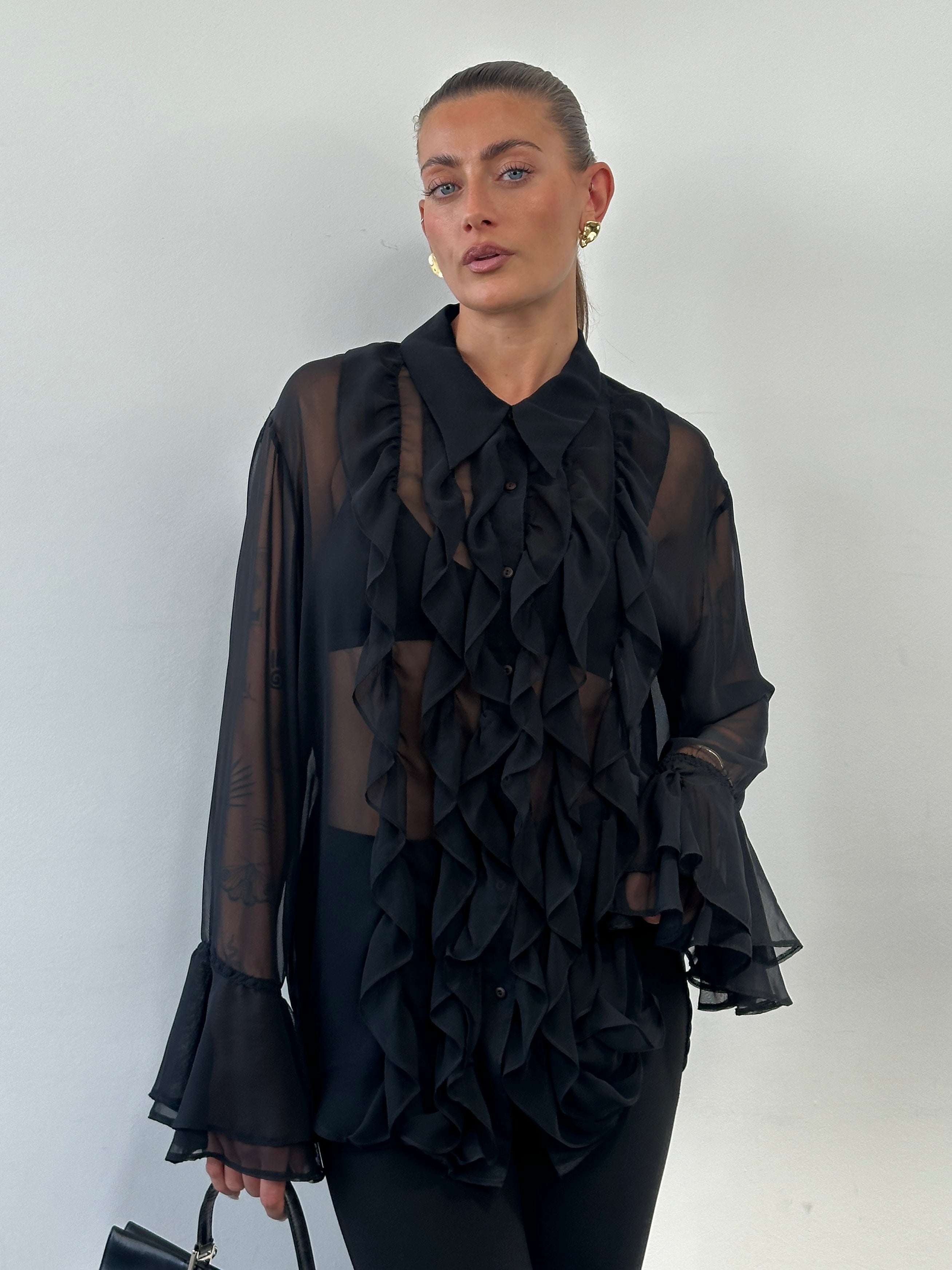 Vintage 00s sheer ruffle shirt in size L/XL, featuring lightweight fabric and delicate ruffle details, worn by a model.