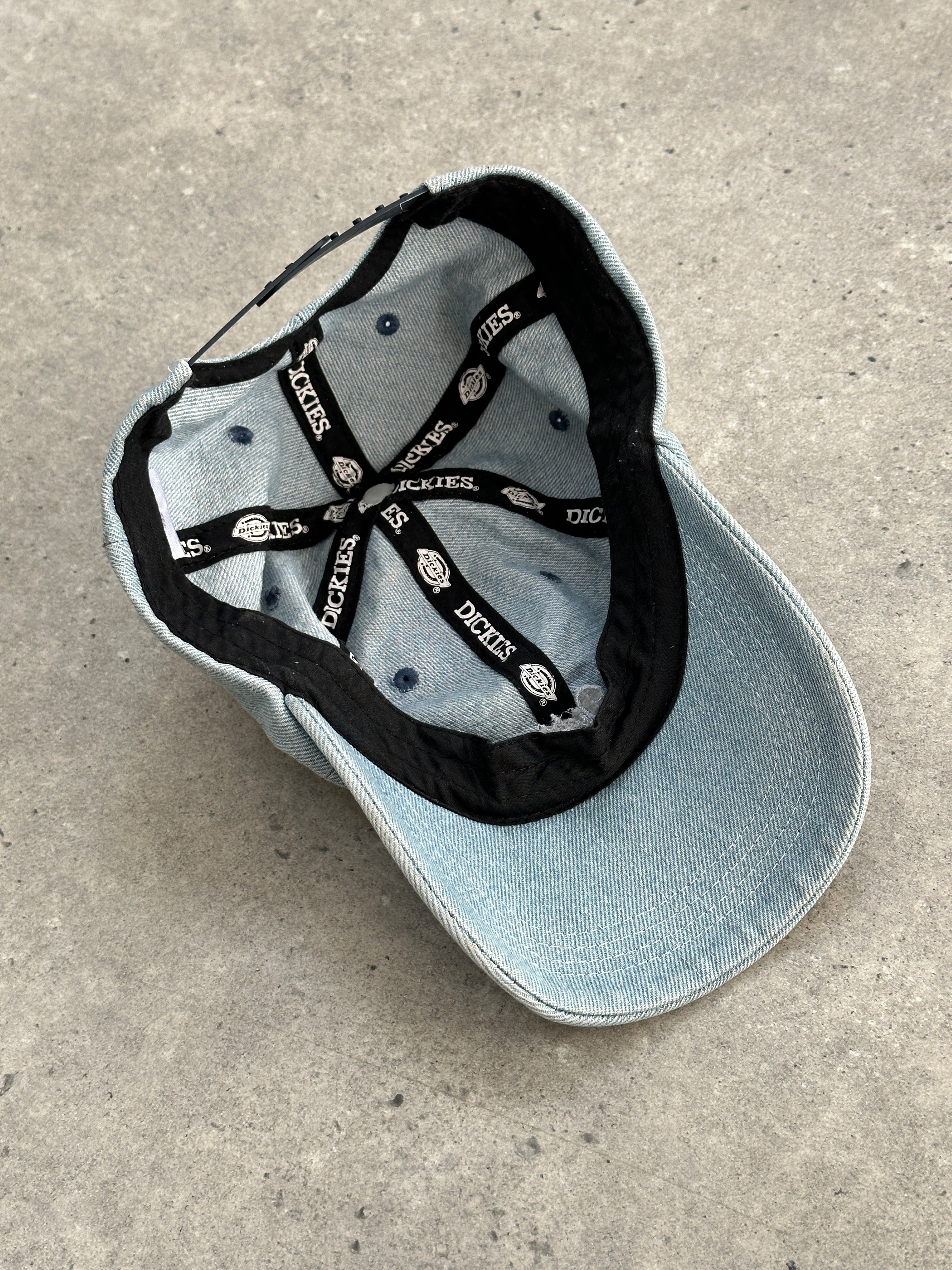 Dickies 2010s cotton denim logo cap hat with adjustable strap and embroidered brand logo on front.