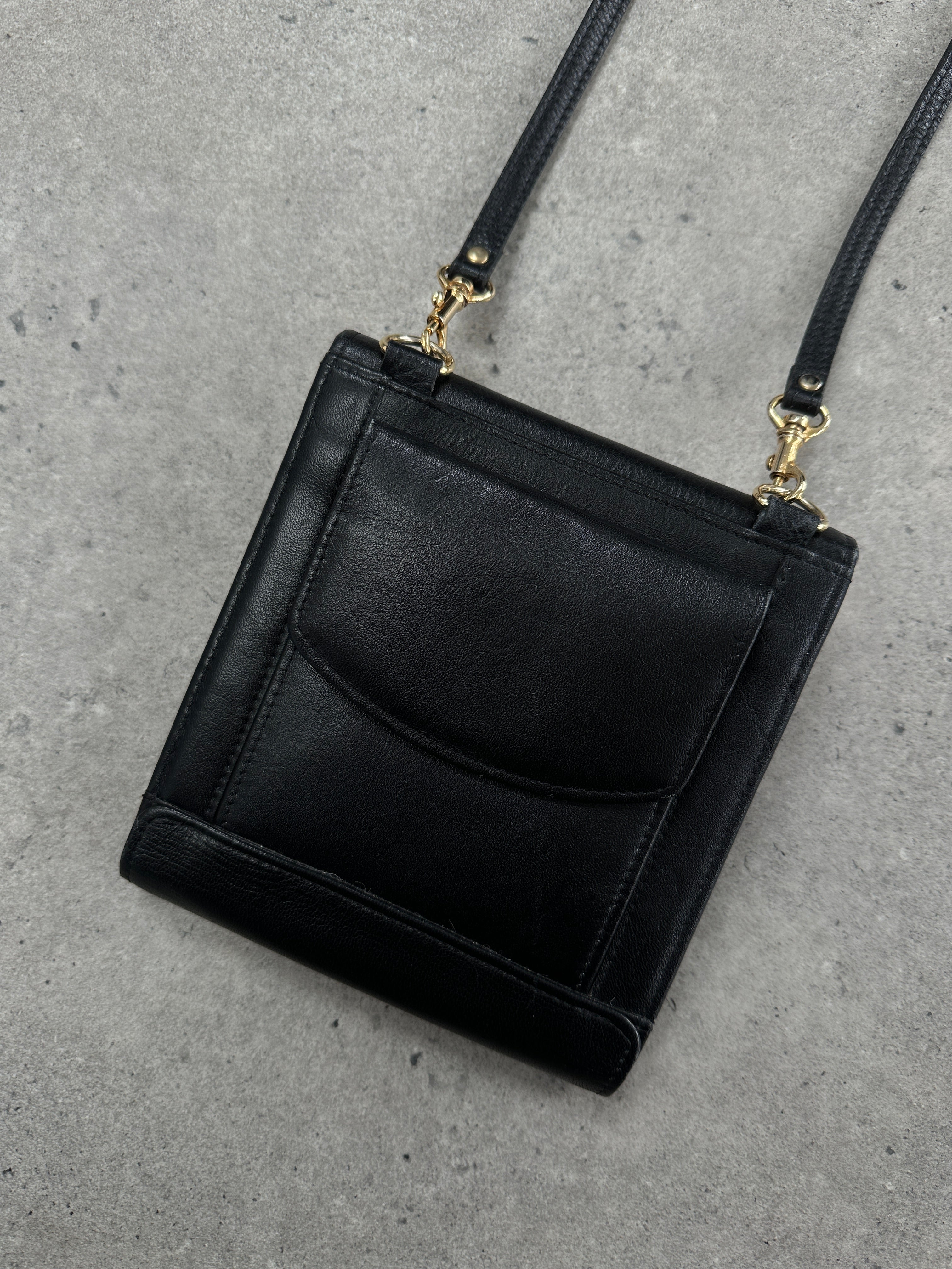 Armani Gianni Versace 1990s Medusa leather crossbody bag with gold-tone hardware and signature Medusa emblem.