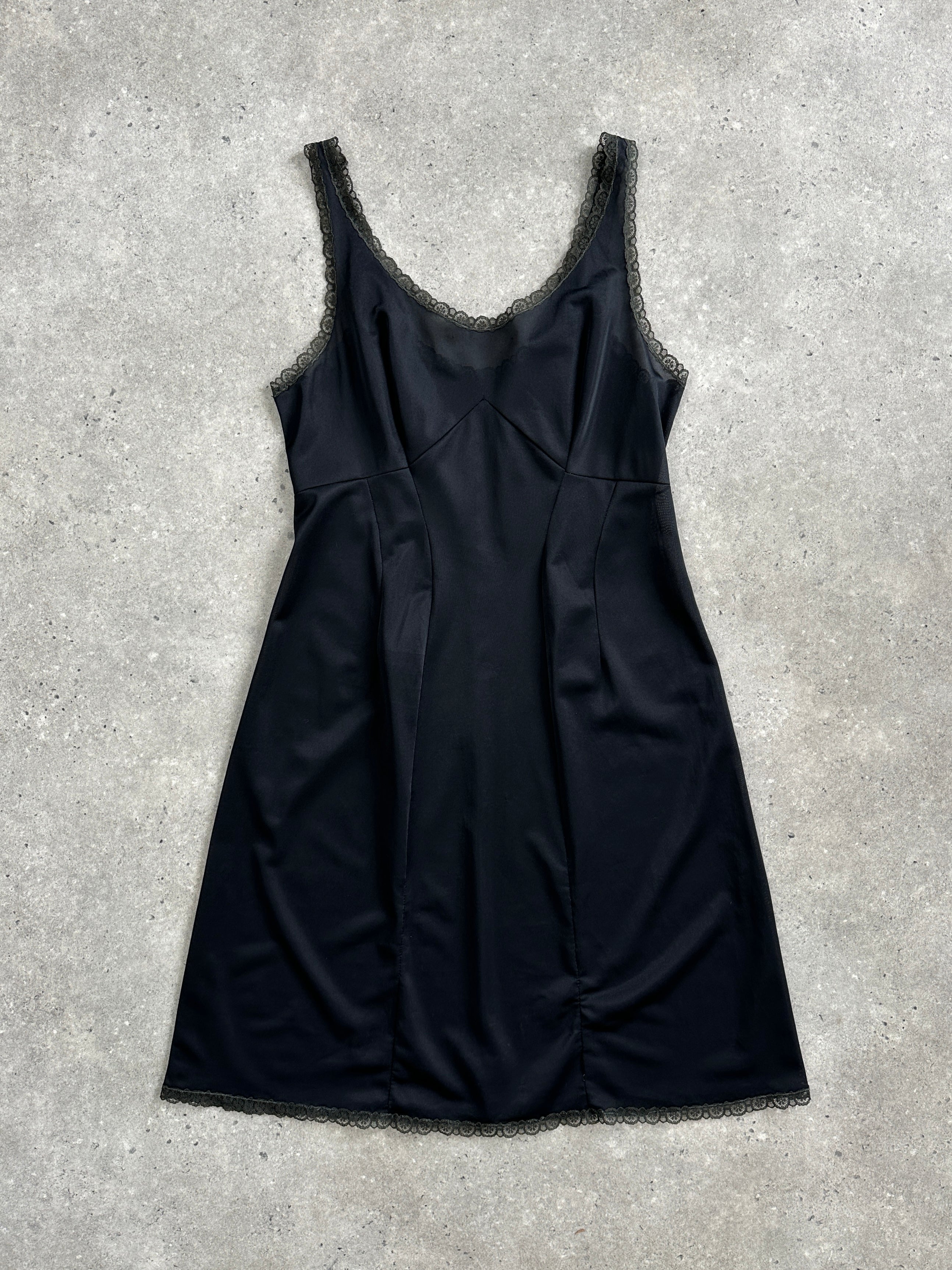 Vintage 1990s lace mini slip dress in size M, featuring delicate lace details and a classic, feminine silhouette.