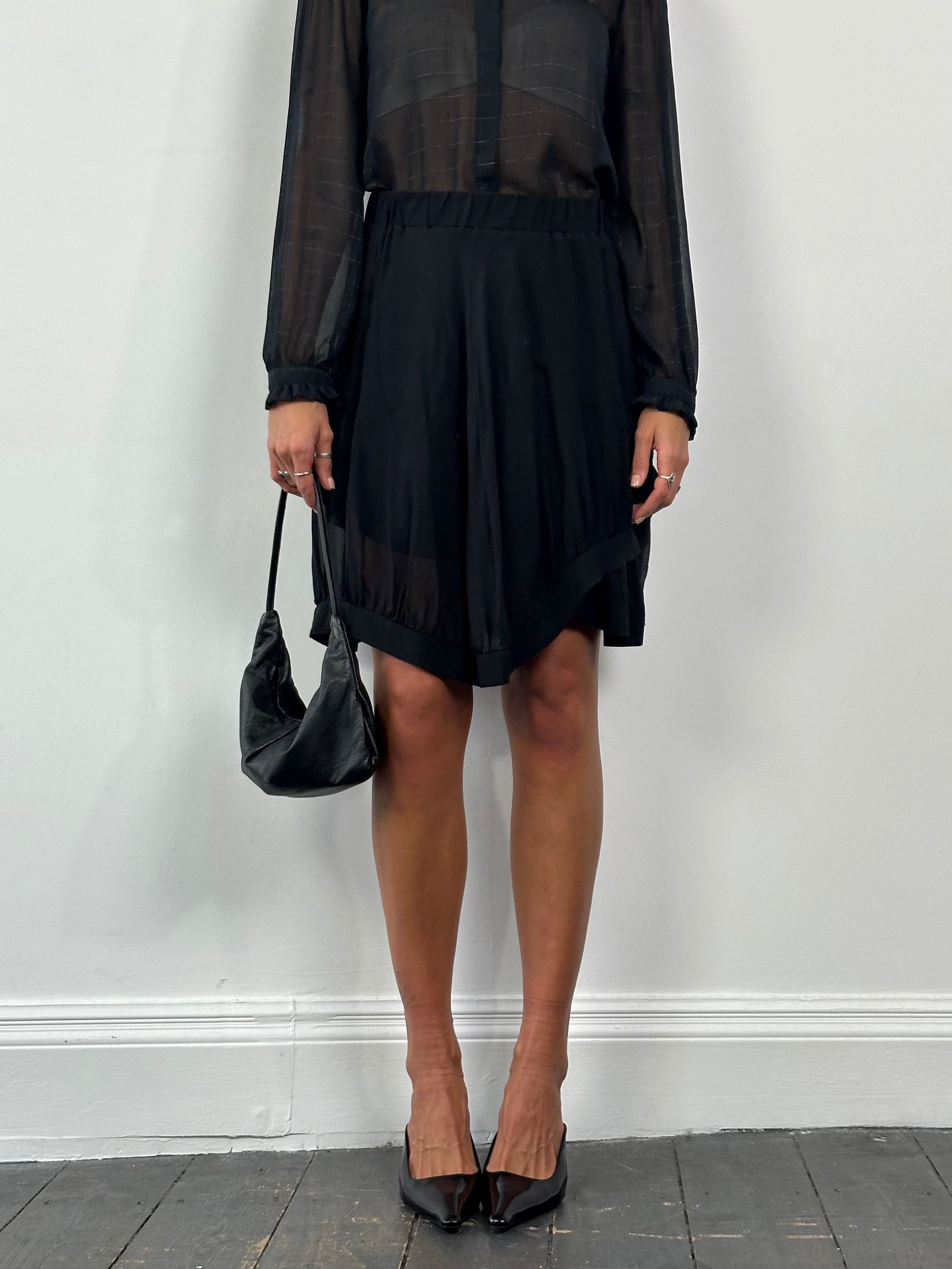 Giorgio Armani pure silk layered skirt in 28-32W with a flowing design and elegant drape, displayed on a neutral background.