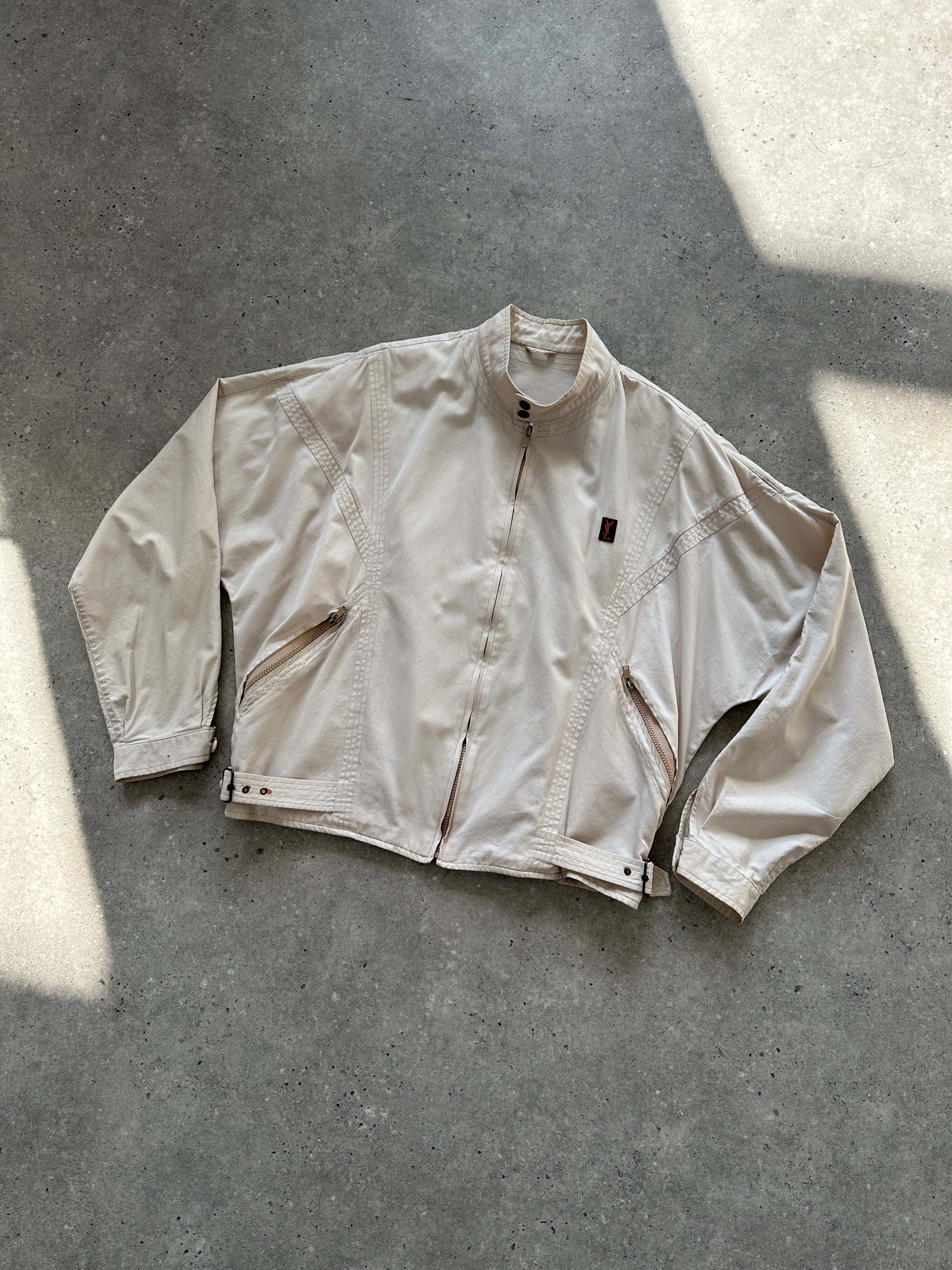 Yves Saint Laurent 70s logo bomber jacket in black with bold YSL branding, front zip closure, and ribbed cuffs and collar.