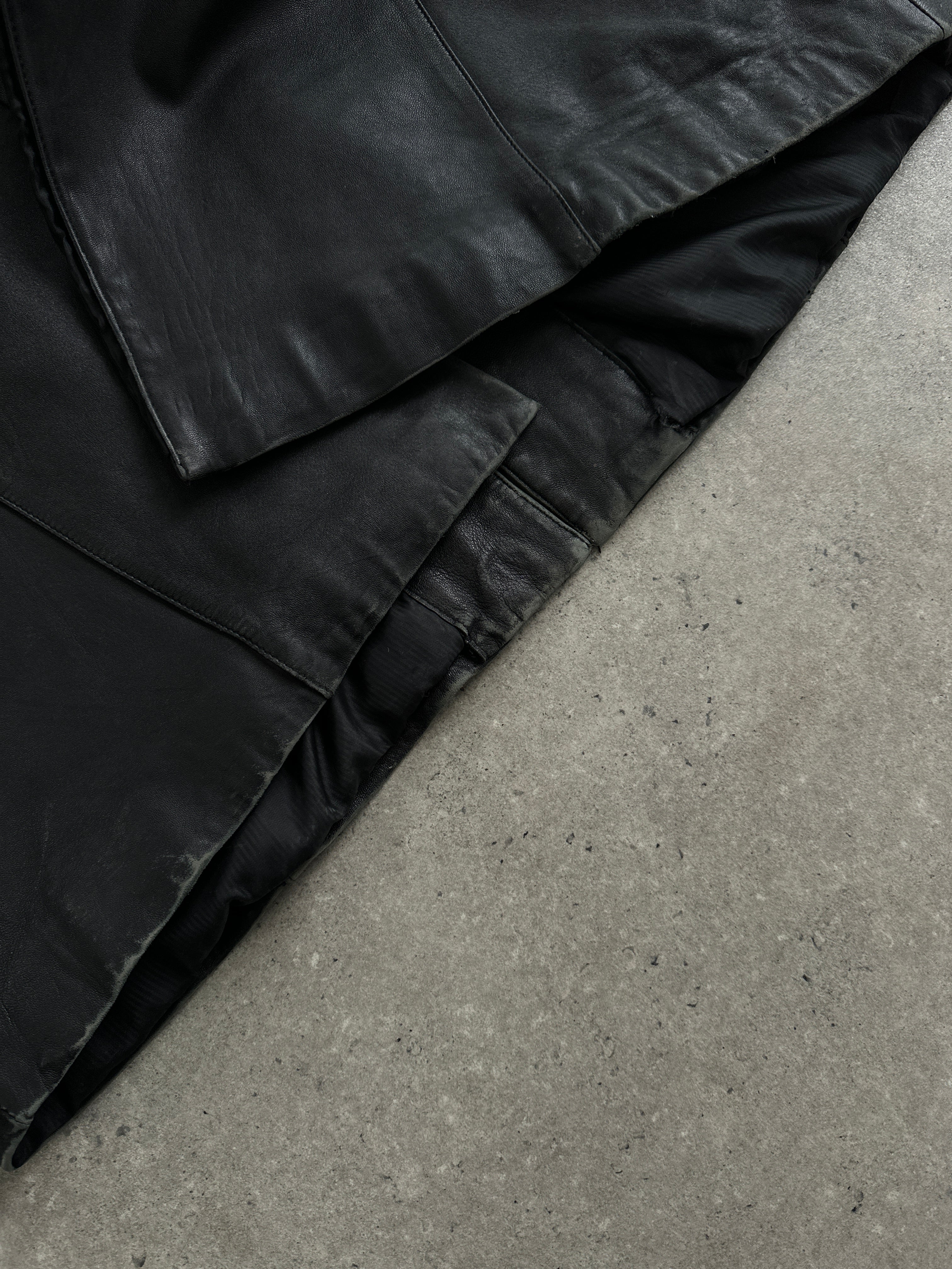 Vintage leather trench coat, floor length belted style in size XL, featuring classic design and high-quality leather.