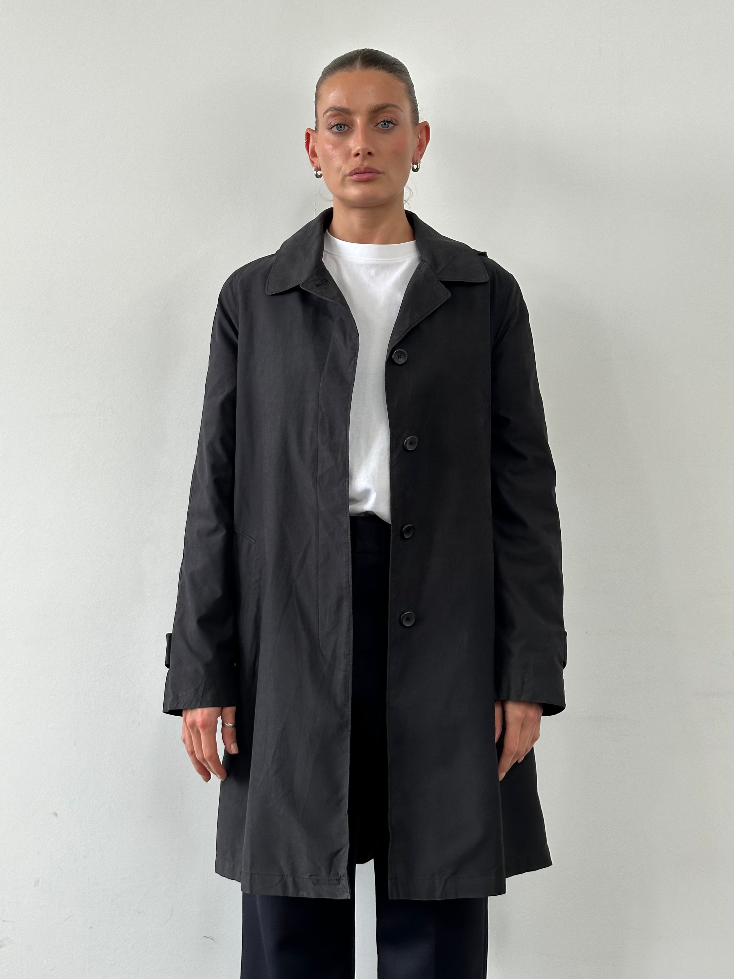 London Fog concealed placket hooded trench coat in size M, featuring a classic design with a hood and concealed front placket.