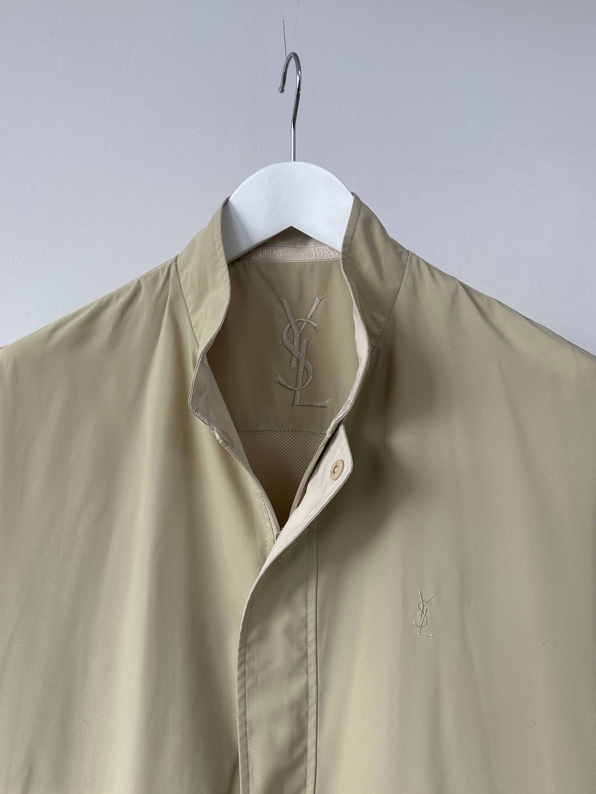 Yves Saint Laurent Pour Homme logo bomber jacket in size M/L, black jacket with YSL branding on the front.