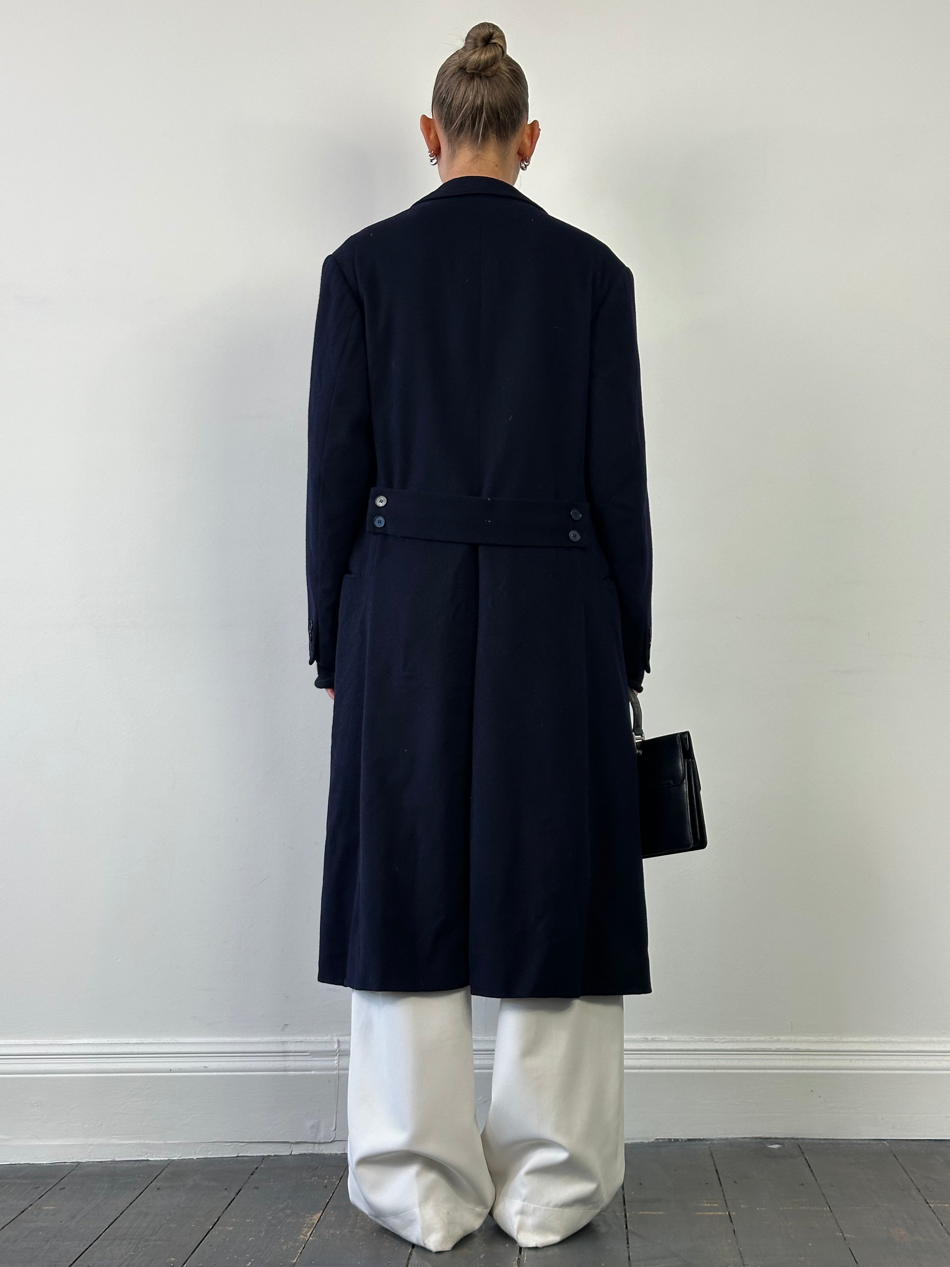 Vintage wool double-breasted floor-length coat in size S/M, with classic tailored design and button details.