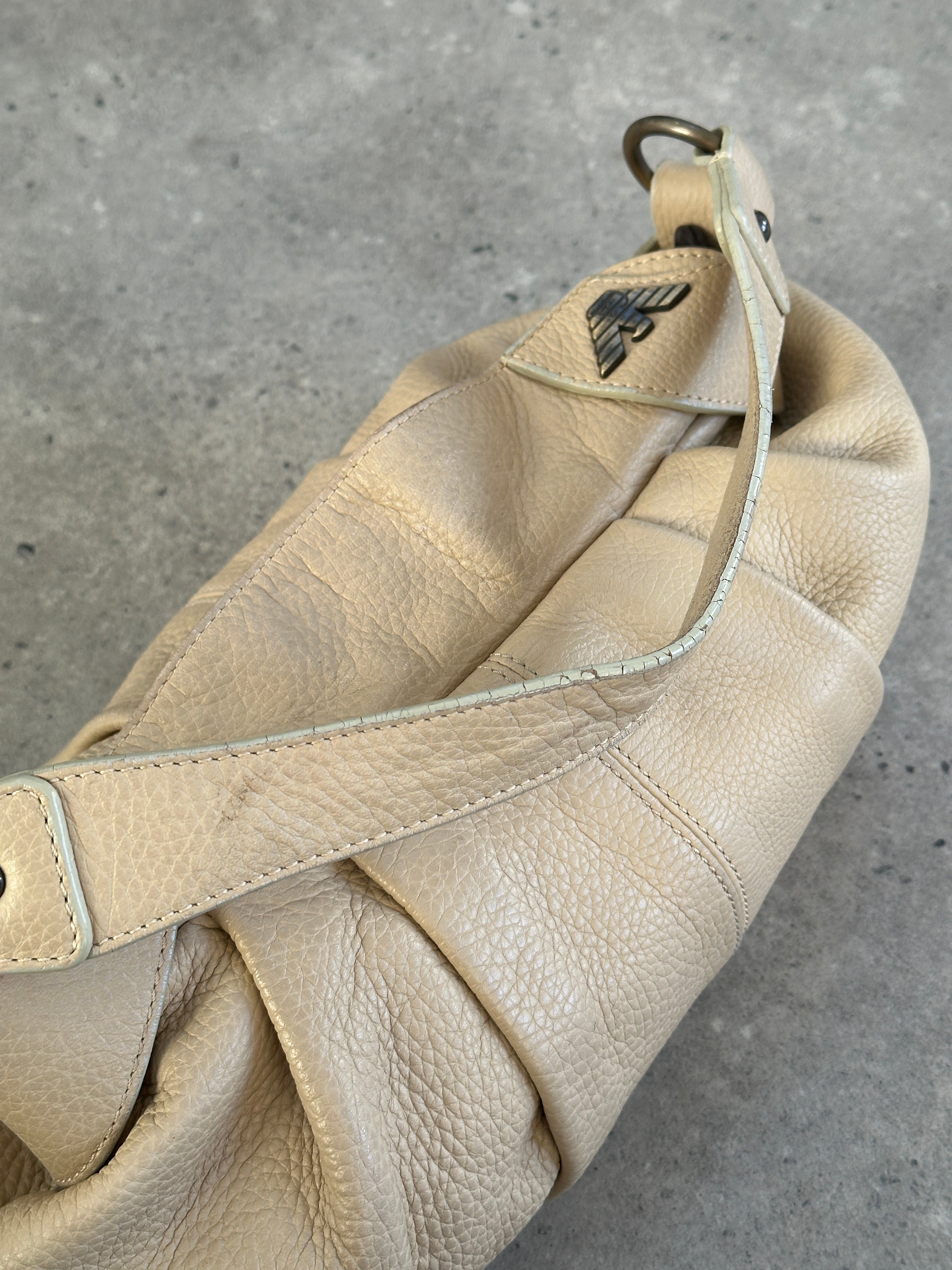 Emporio Armani leather pleated shoulder bag with structured design and shoulder strap, 2000s style.