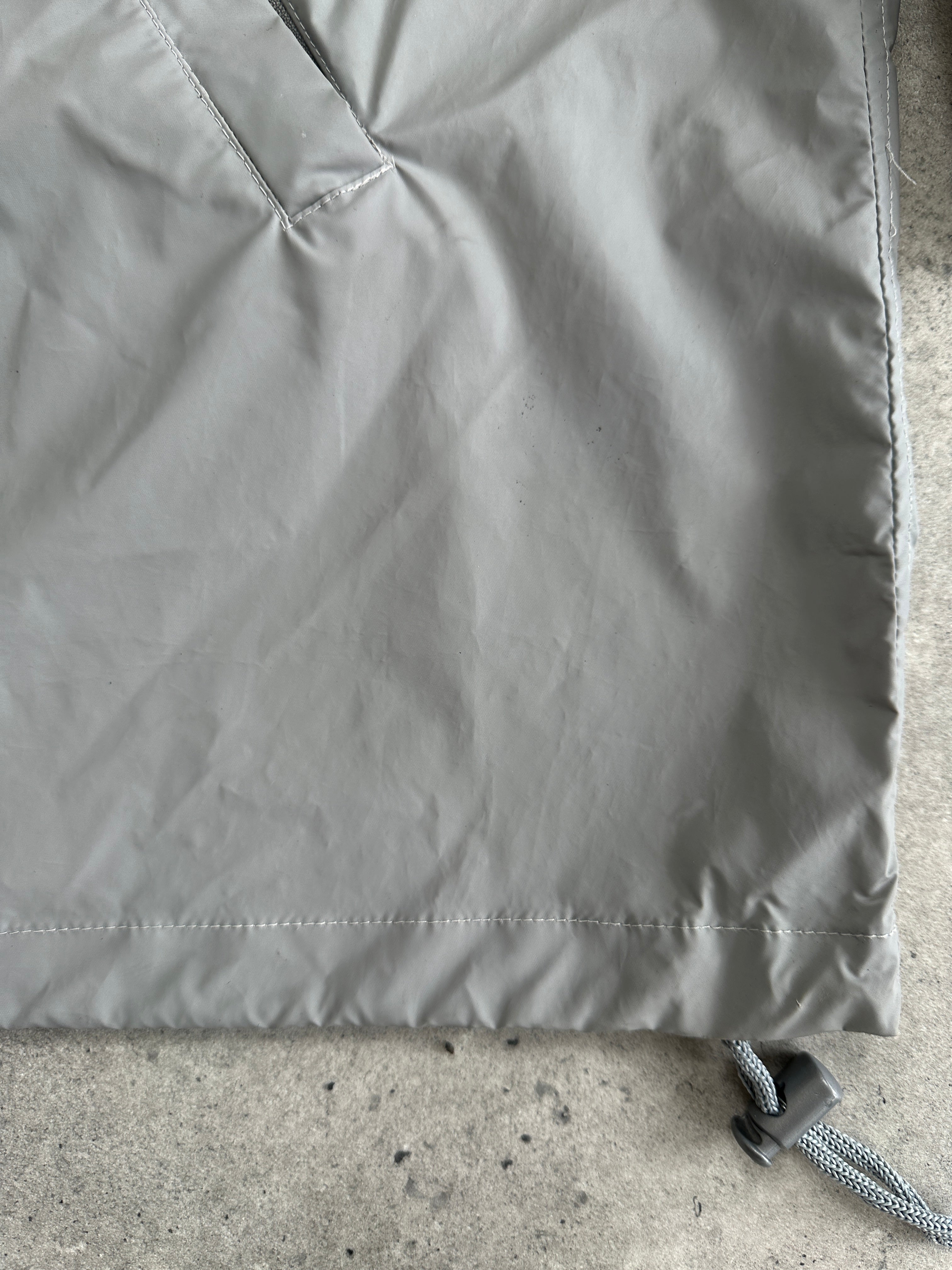 Valentino Sport raincoat jacket in size L, lightweight waterproof outerwear with sleek design and subtle branding.