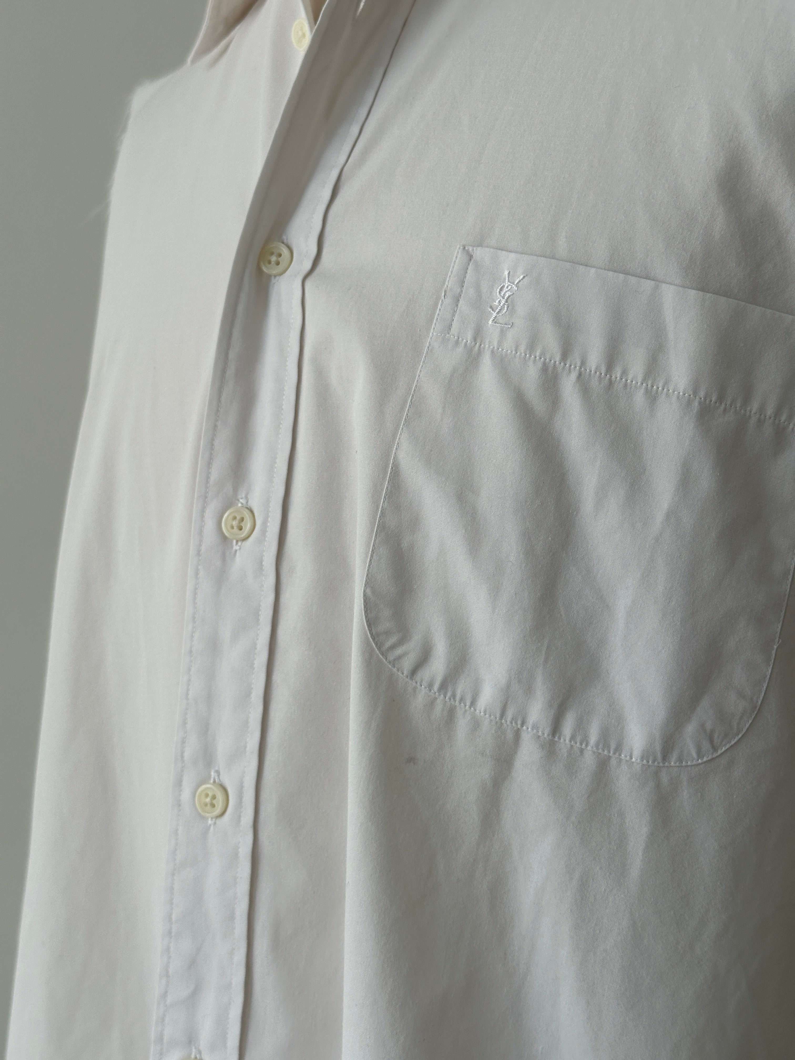 Yves Saint Laurent 2000s cotton sleeveless logo shirt in size L, white with YSL branding on the front.