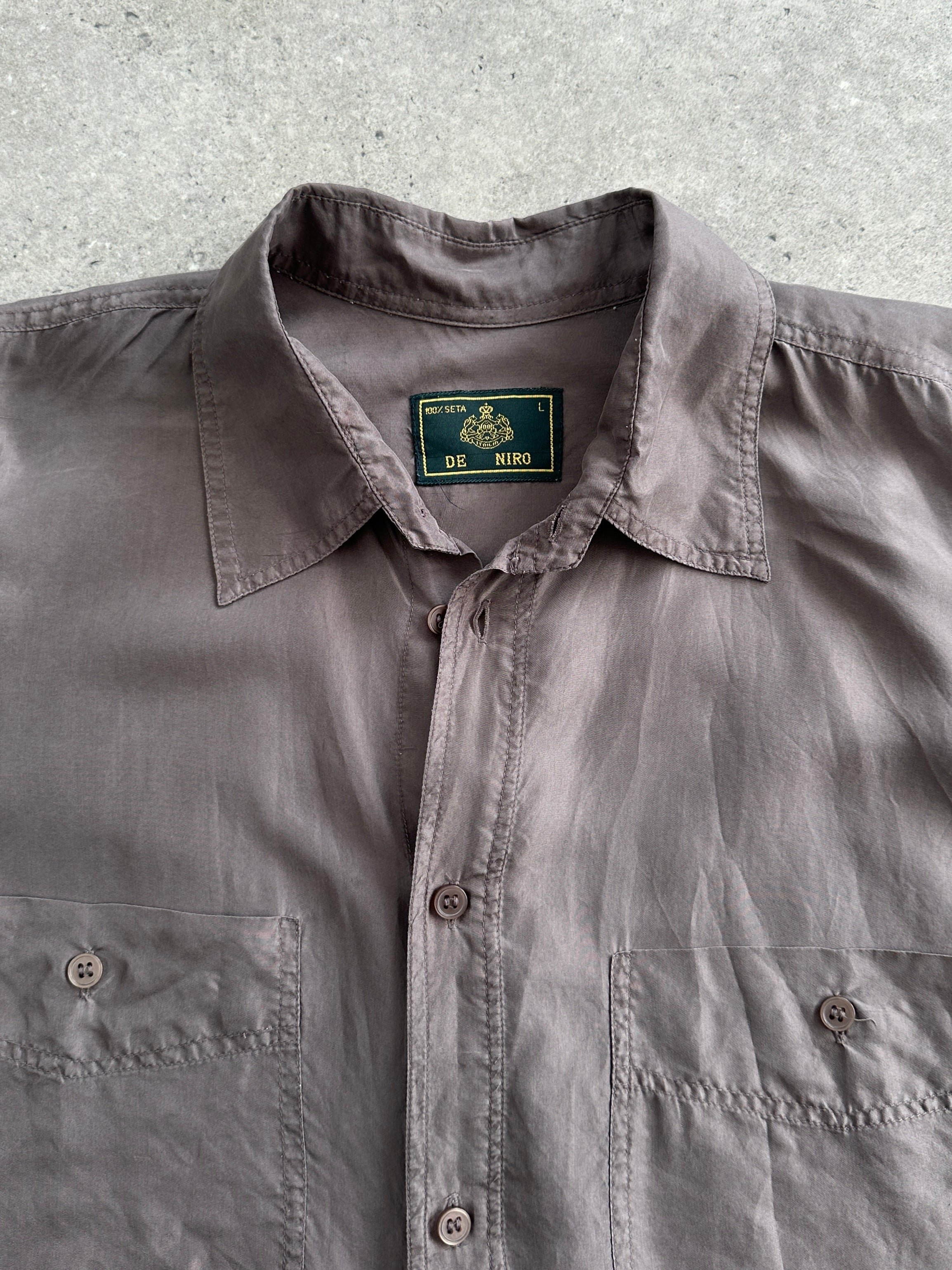Vintage pure silk shirt in XL size, featuring a classic design with a smooth, shiny fabric and elegant collar detail.