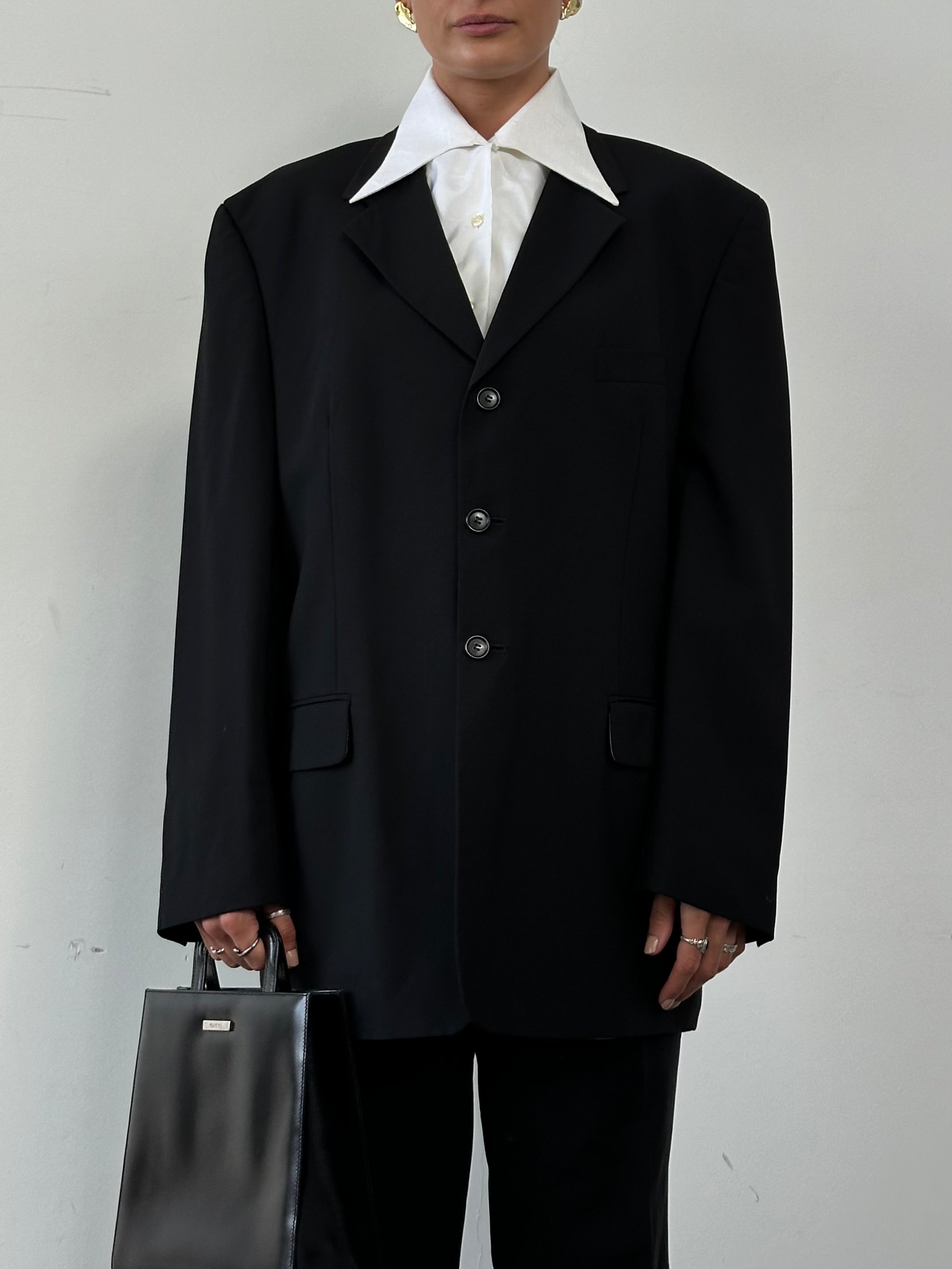 Pierre Cardin pure wool single-breasted blazer in XL/XXL, tailored fit, dark navy color, with lapel collar and button closure.