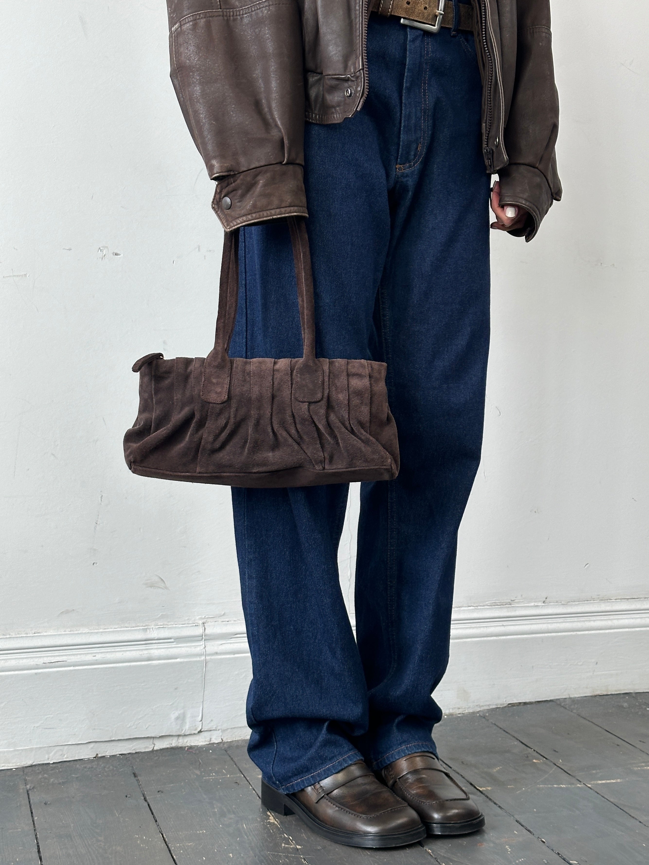 Abro Italian suede leather shoulder bag with ruched design, featuring a classic and stylish look in a neutral tone.
