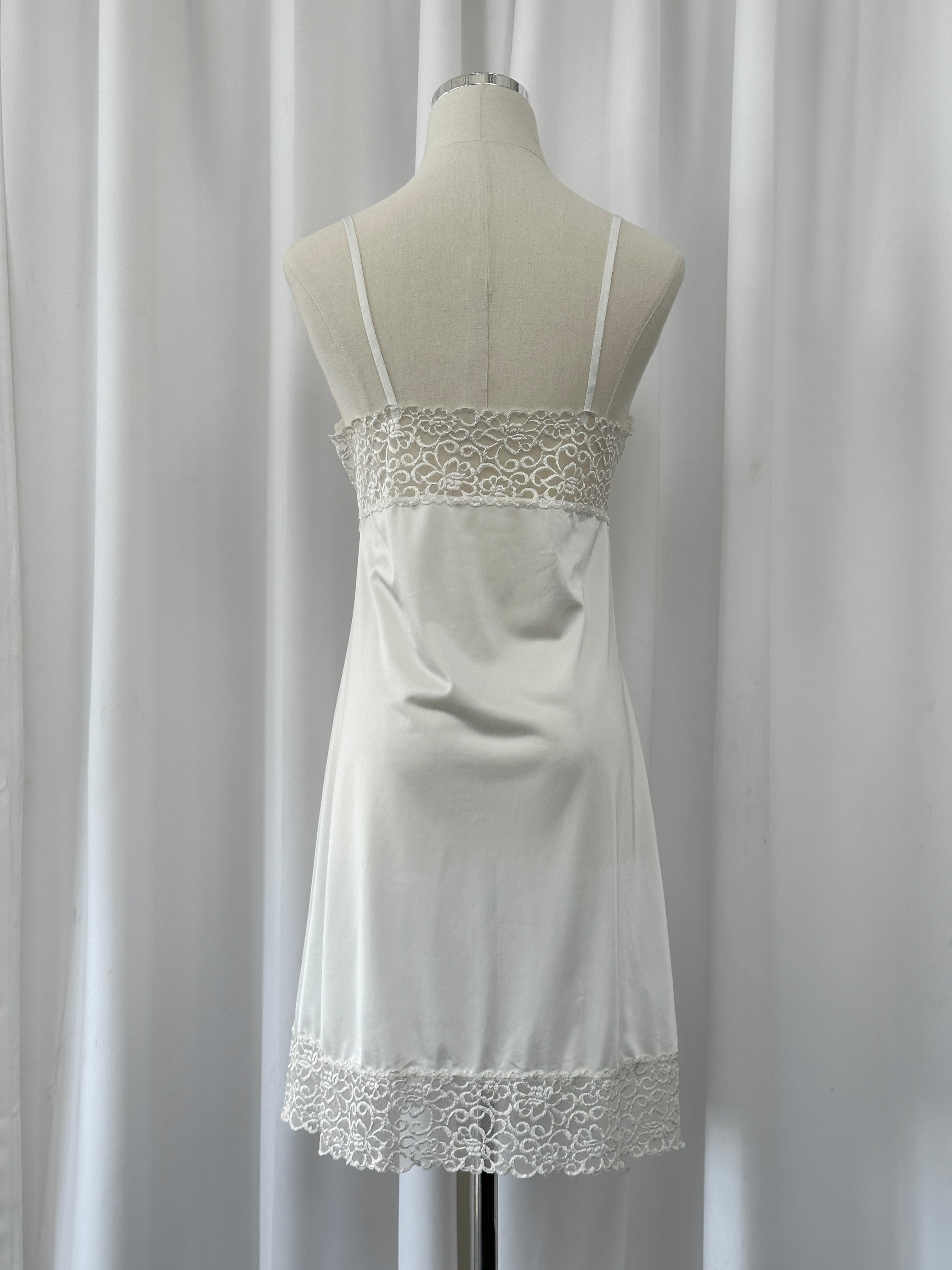 Japanese vintage 1990s lace sheer mini slip dress in size S, featuring delicate lace fabric and a classic 90s design.