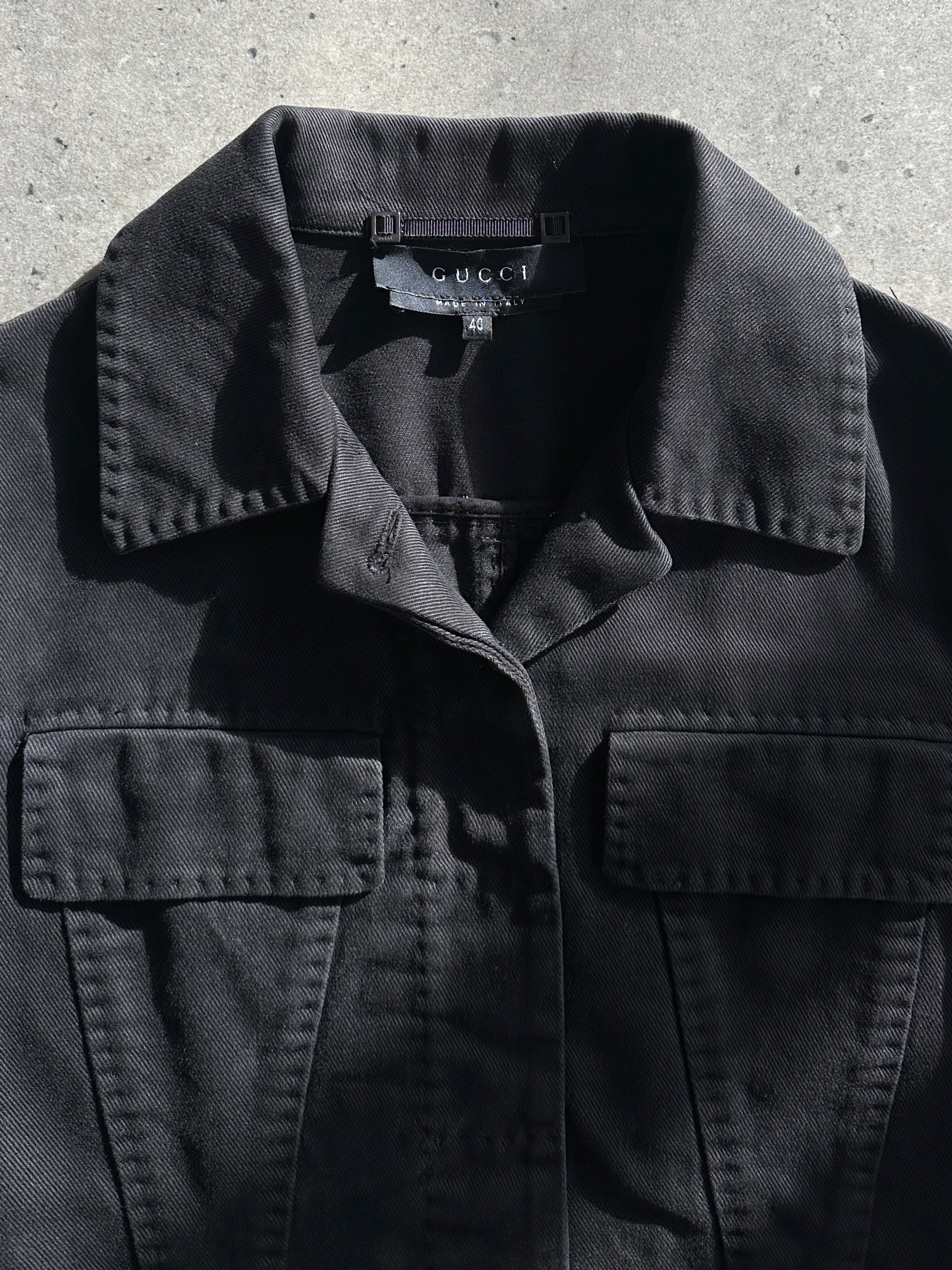 Gucci by Tom Ford 2002 fitted denim jacket in XS, stylish blue denim with classic stitching and button closure.