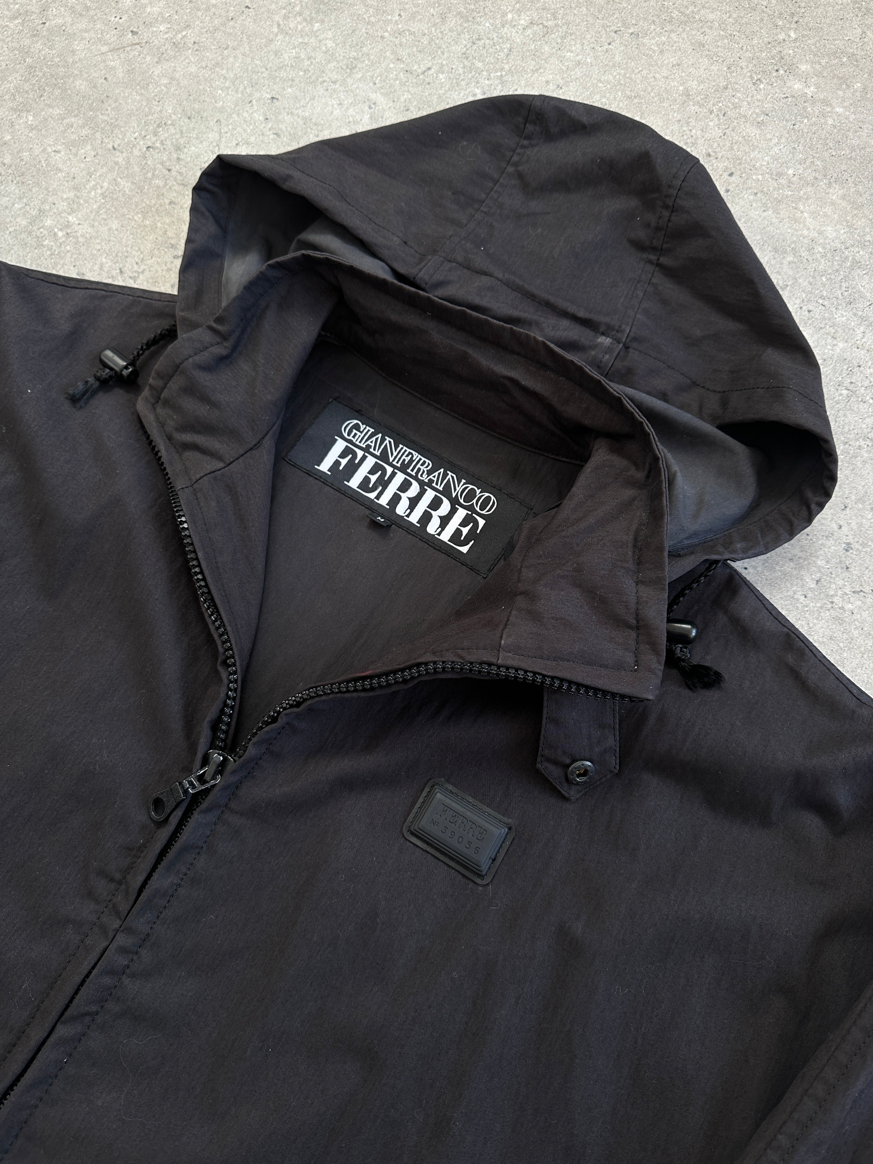 Gianfranco Ferre crinkle hooded parka coat in XL, showcasing its textured fabric and relaxed fit with a hood and front zipper.