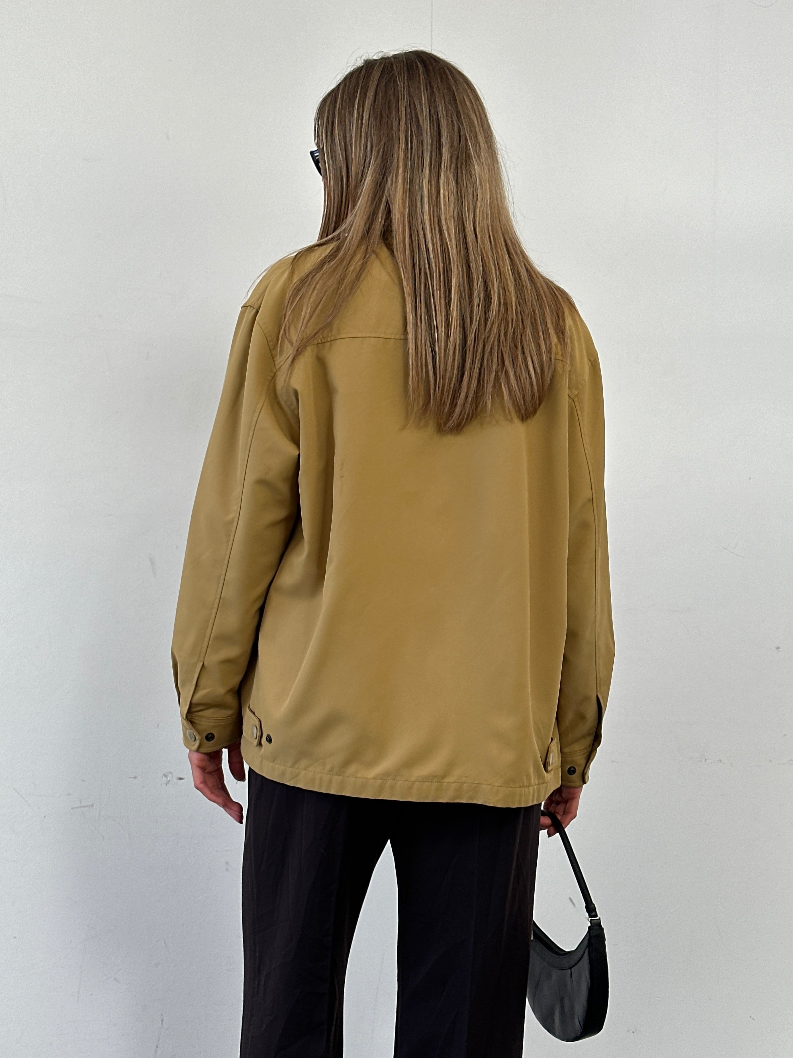 Yves Saint Laurent Pour Homme padded logo bomber jacket in black, front view showcasing the stylish design and branding.