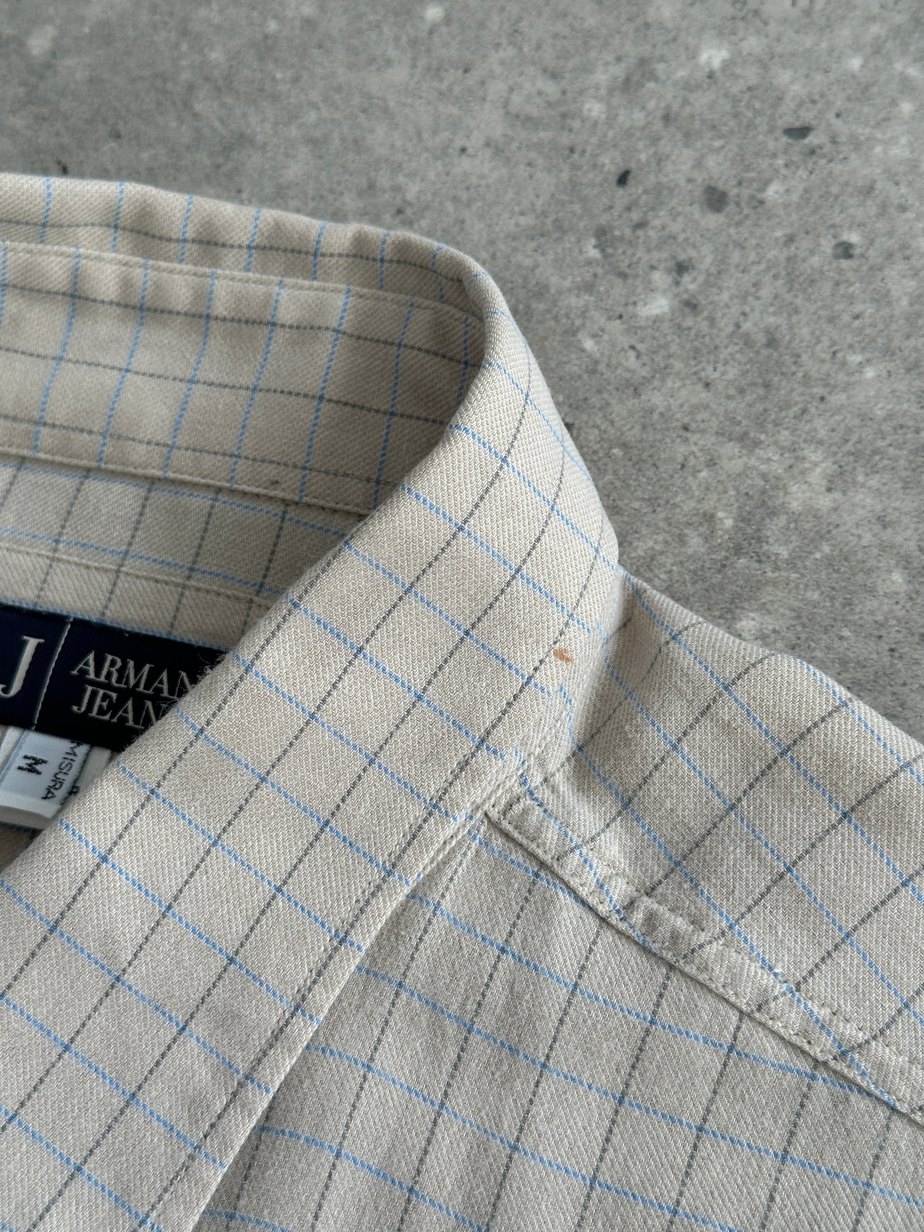 Armani Jeans check pure cotton logo shirt in size L/XL, featuring a classic check pattern and the Armani logo on the chest.
