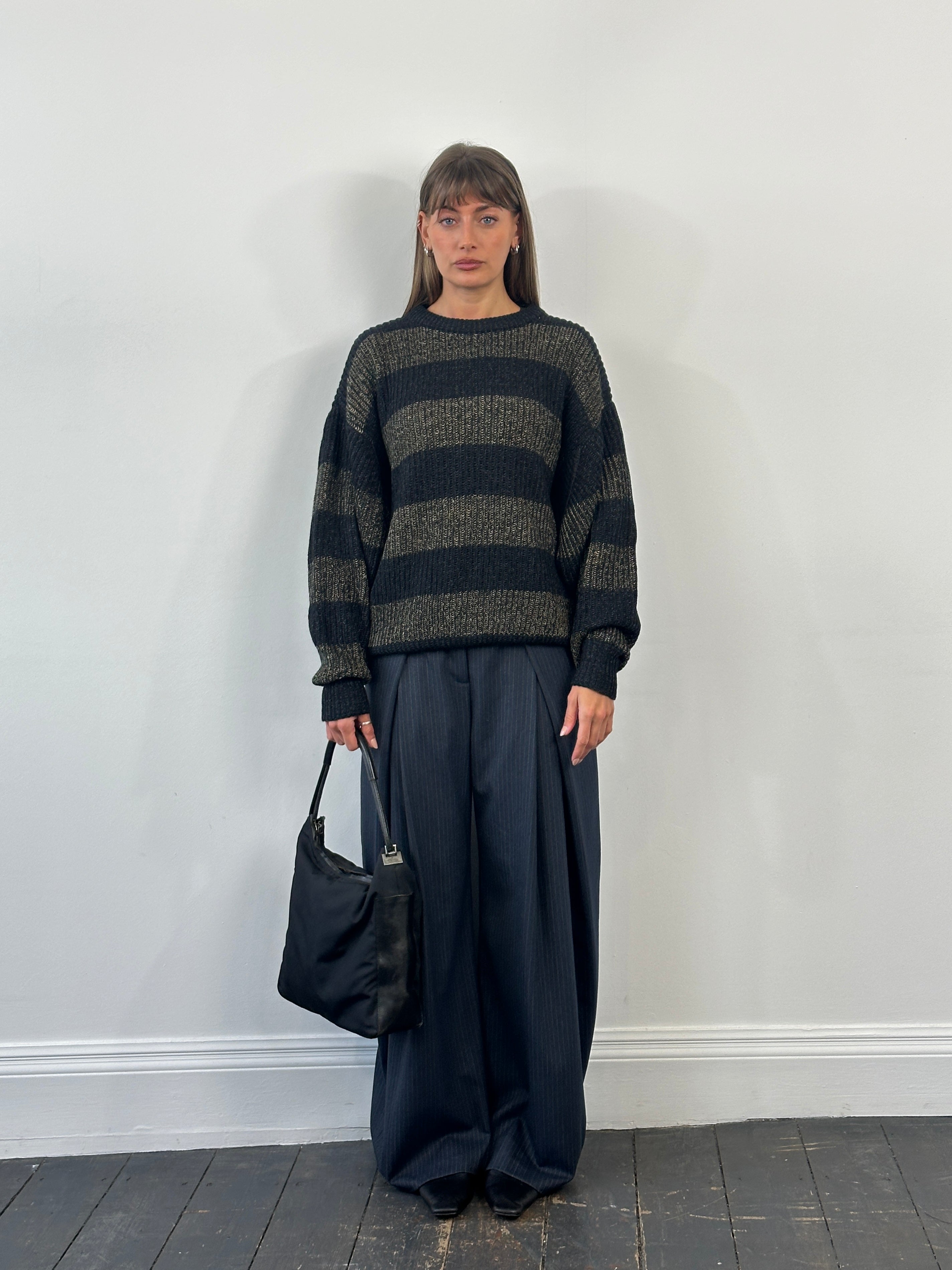 Vintage Italian 1990s wool alpaca striped jumper in XL/XXL, showing cozy knitted fabric and colorful pattern details.