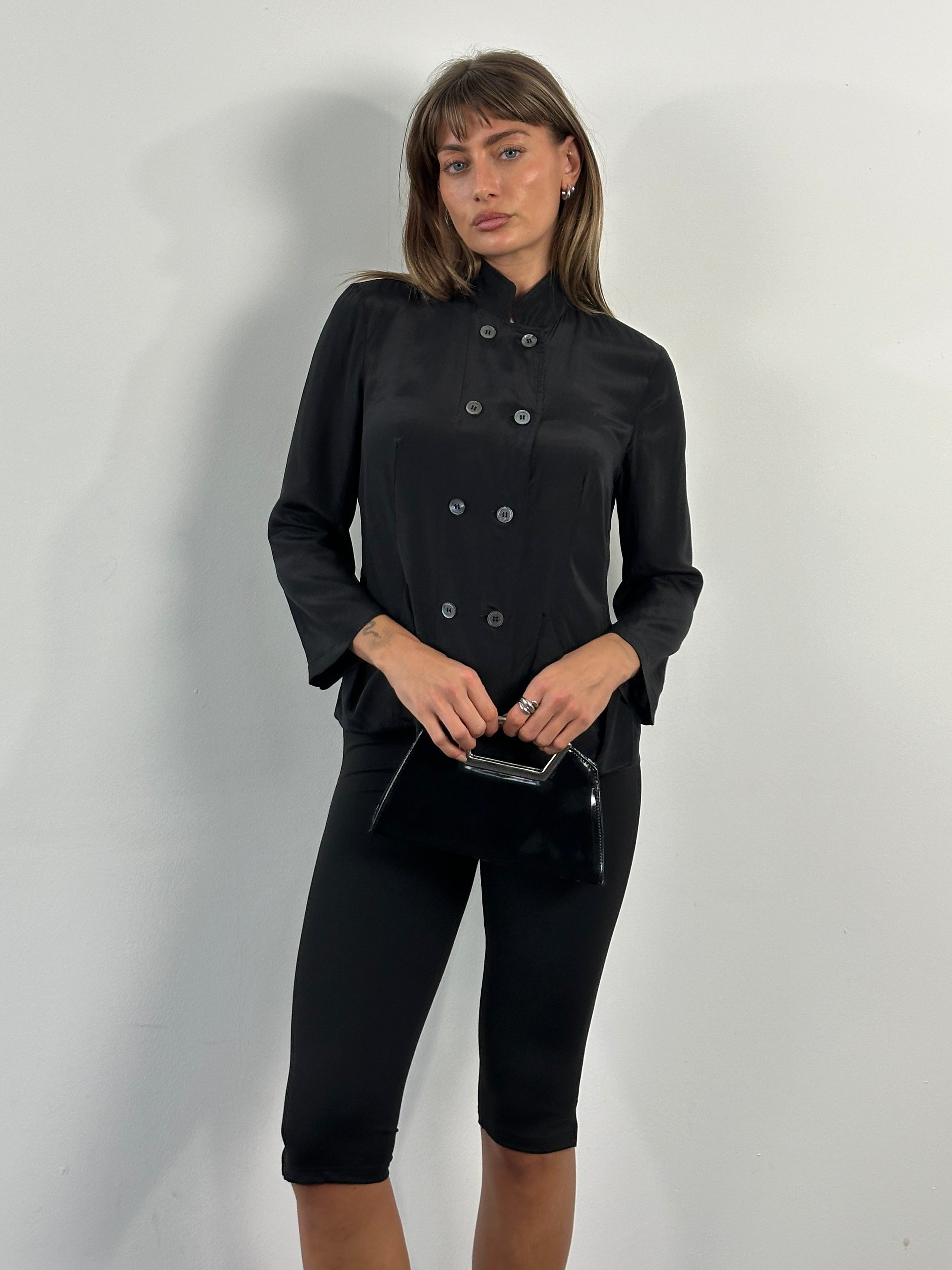 Nicole Farhi 2000s pure silk double-breasted shirt in S/M, shown in natural light, featuring classic collar and button details.