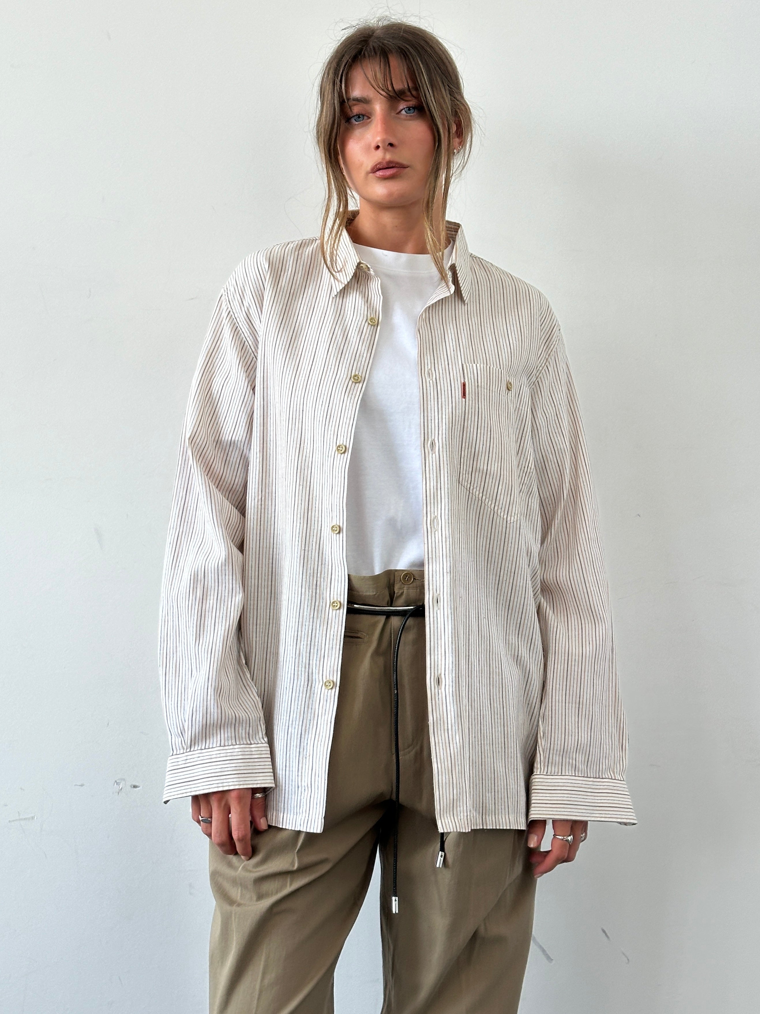 Missoni 90s cotton stripe shirt in large/extra-large size, featuring colorful horizontal stripes and a classic button-up design.