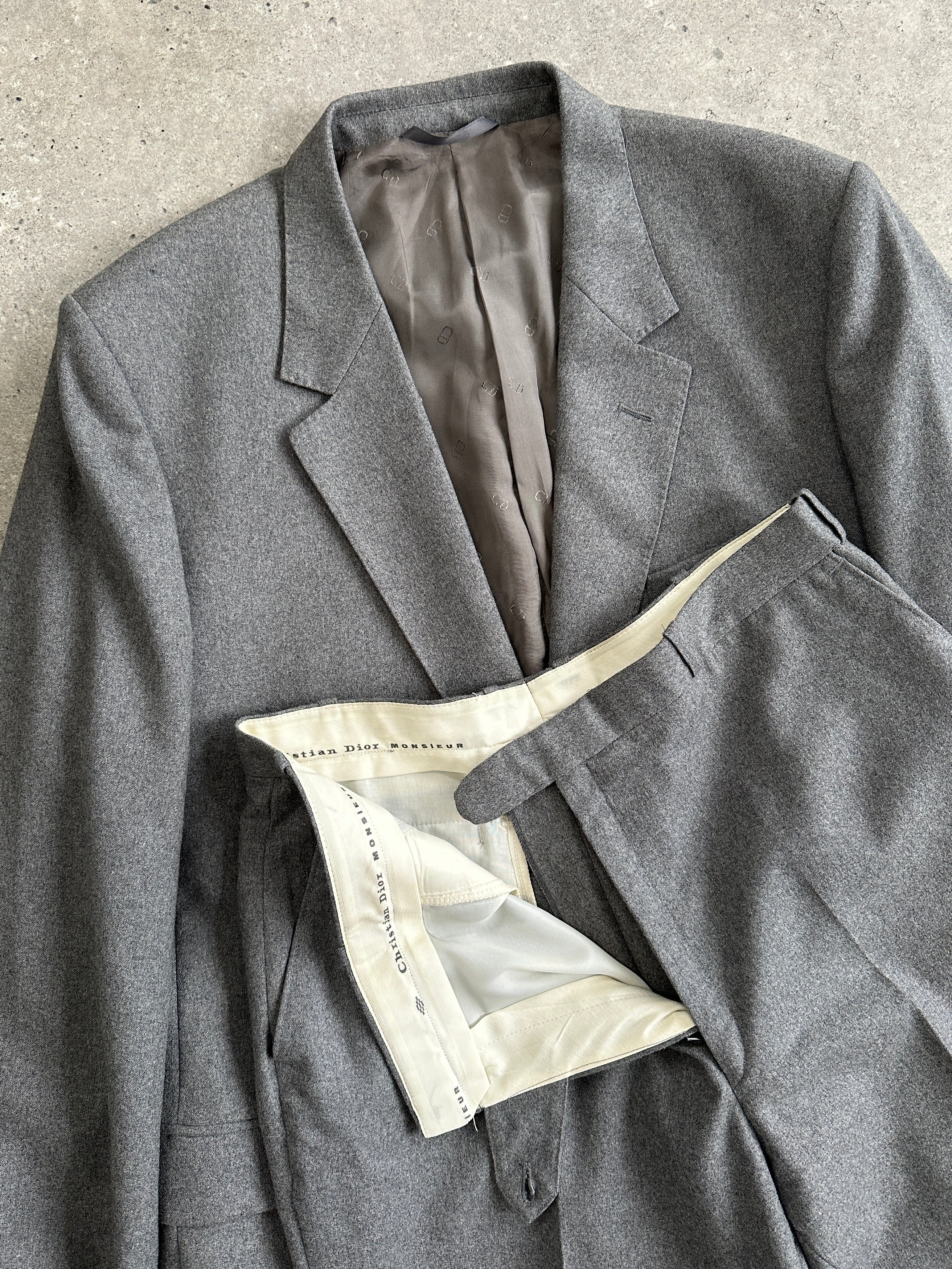 Christian Dior pure wool single-breasted suit jumpsuit in size 44R/W32, showcasing tailored design and classic style.