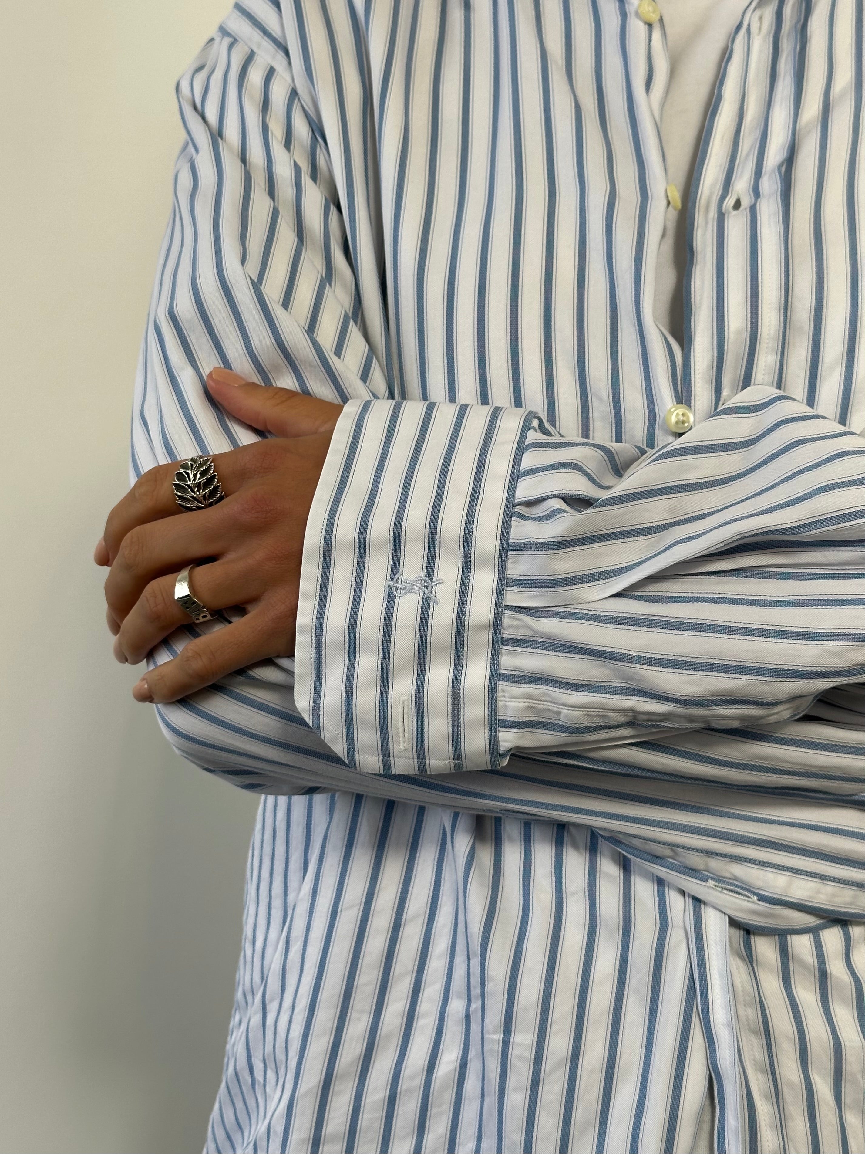 Yves Saint Laurent Pour Homme stripe logo shirt in size L/XL, featuring classic design and brand logo on the front.