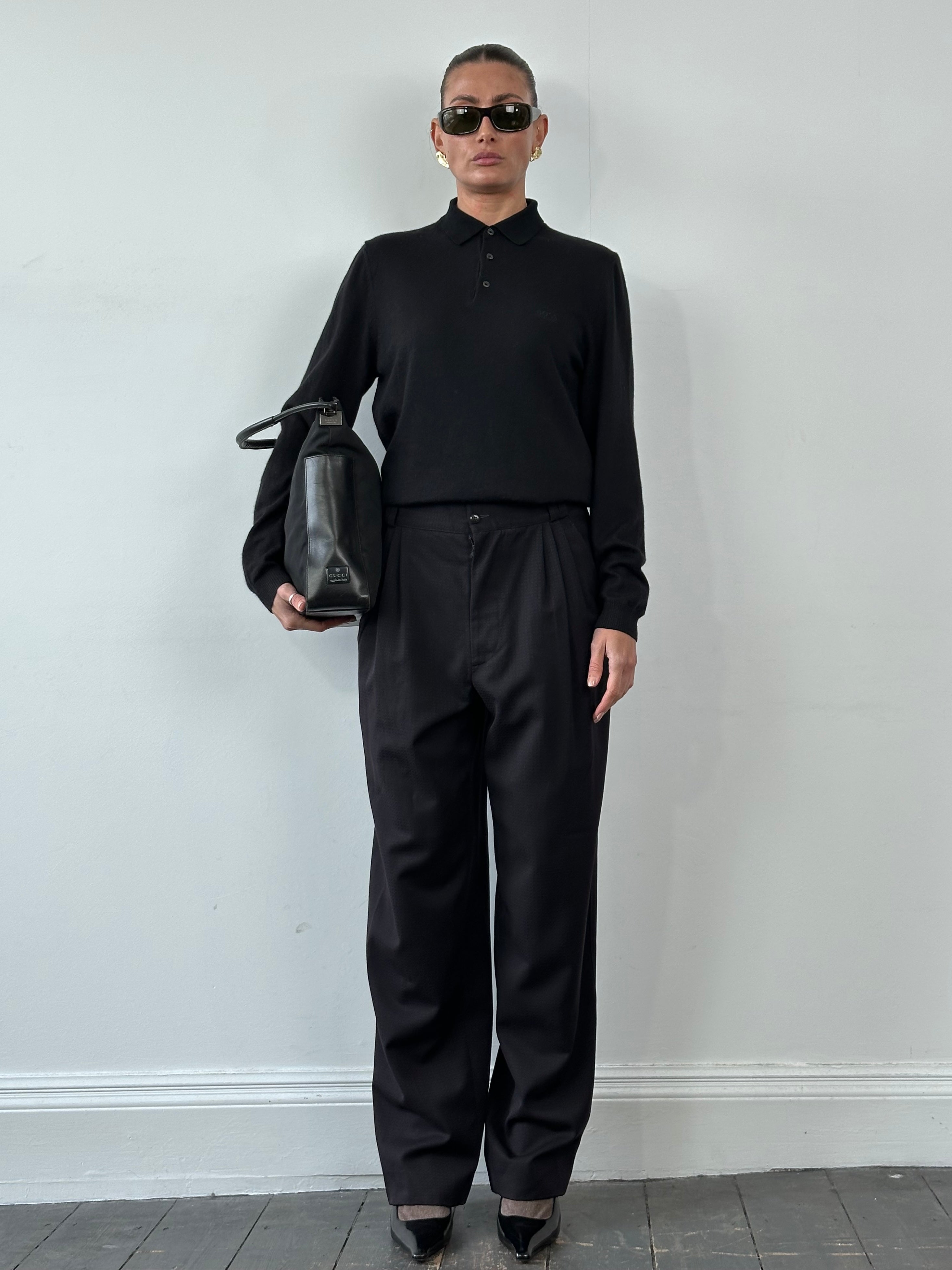 Gianni Versace 80s pure wool tapered leg tailored trousers in deep navy, featuring classic design and tailored fit.