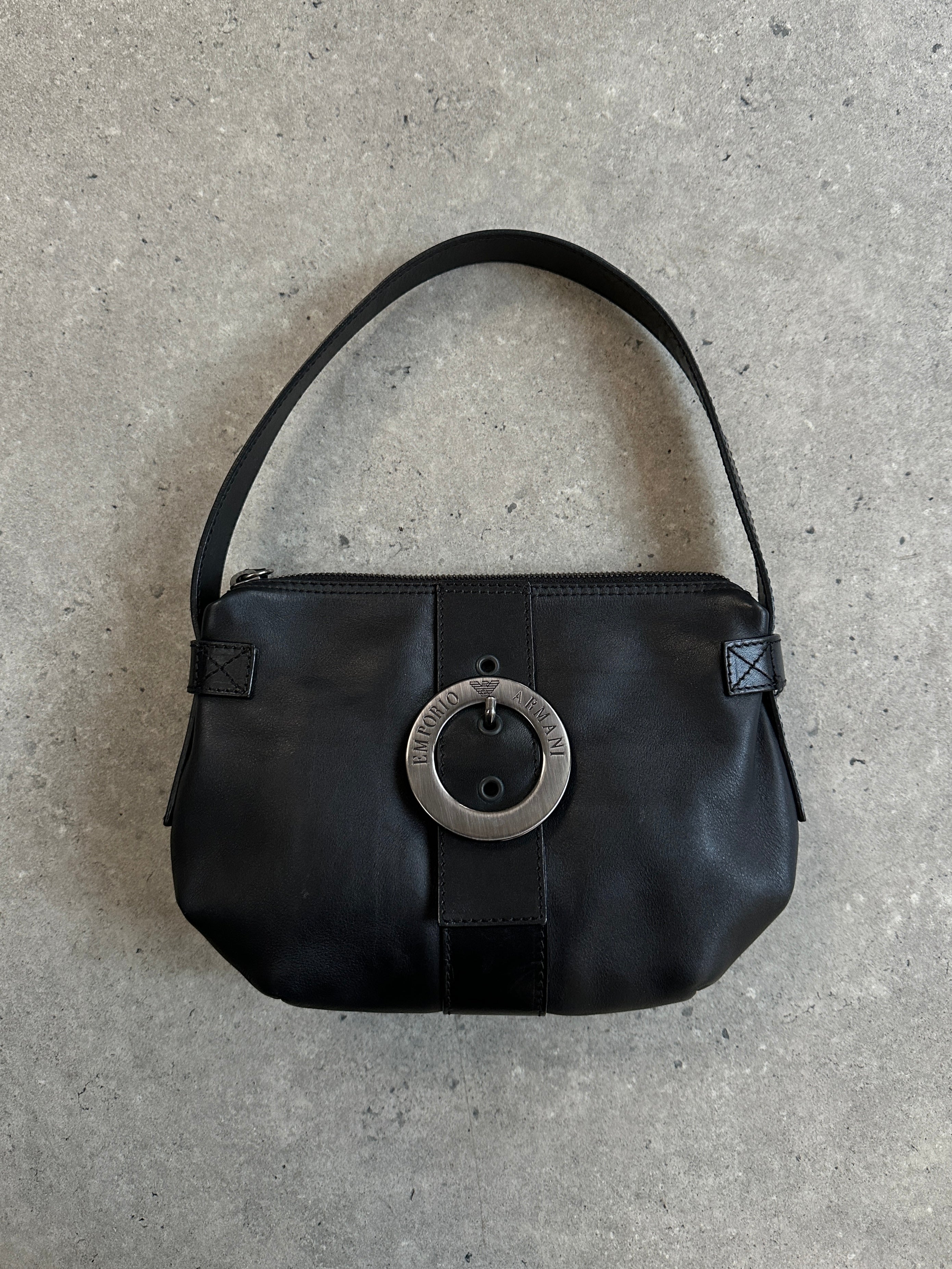 Emporio Armani 2000s leather shoulder bag with sleek design and adjustable strap, showcasing classic luxury style.
