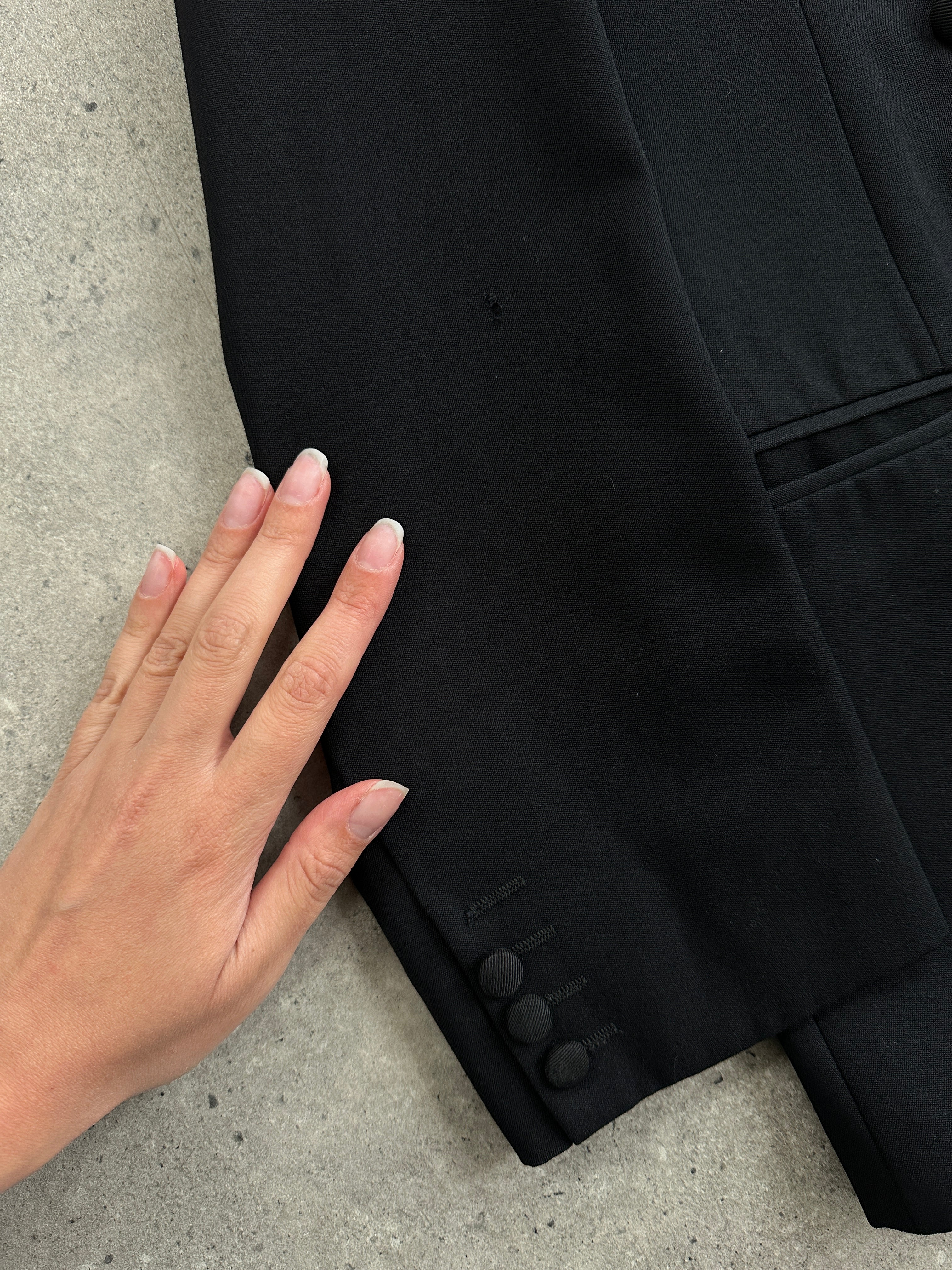Christian Dior Monsieur tuxedo jumpsuit, double-breasted design in size 42S/W34, tailored fit with classic black fabric.