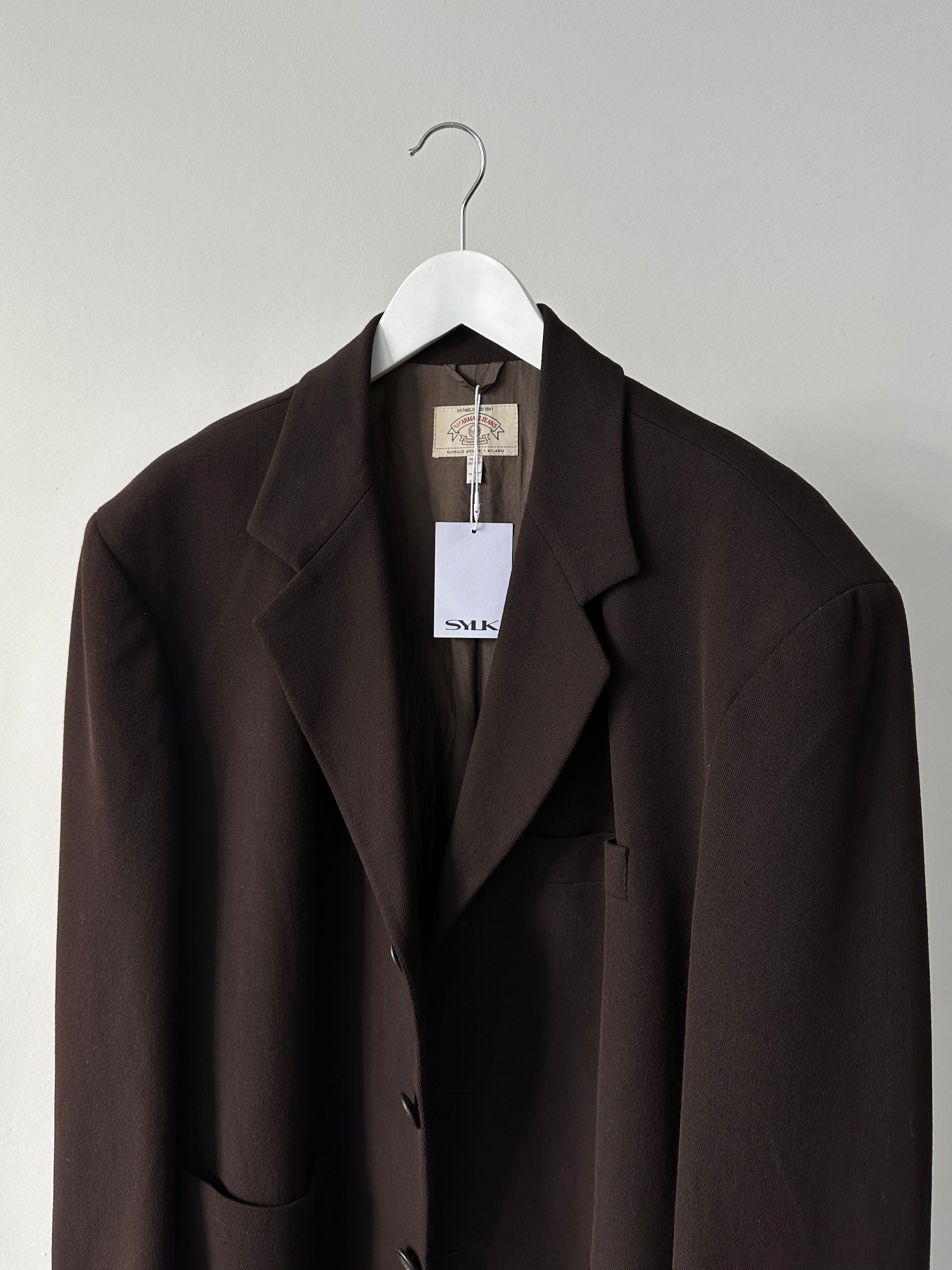 Armani oversized single-breasted blazer in size 46/XL, tailored fit, with classic lapel and structured design.