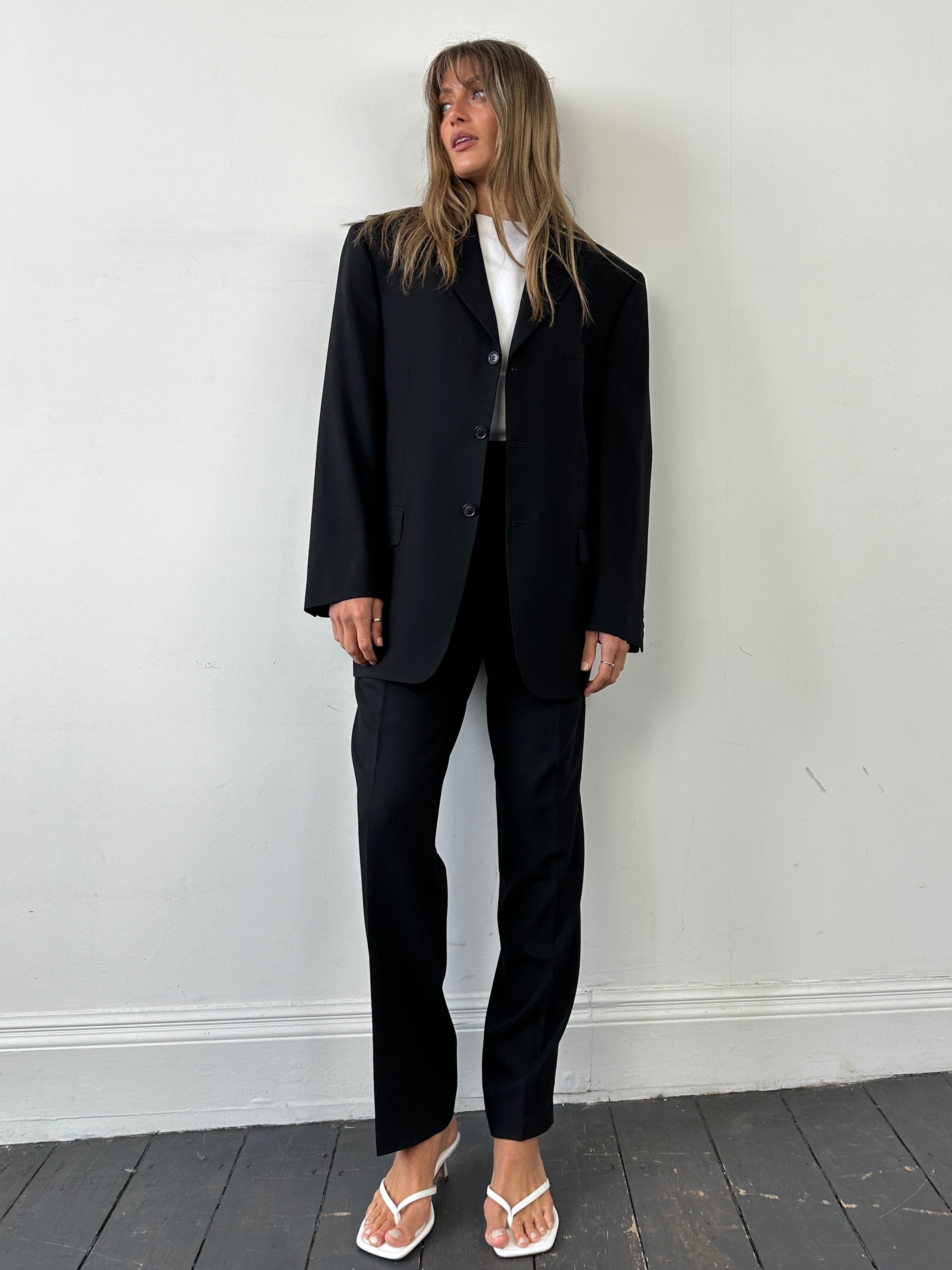 Pierre Cardin pure wool single-breasted suit jumpsuit in size 40R/W34, tailored fit, with classic lapel and button closure.