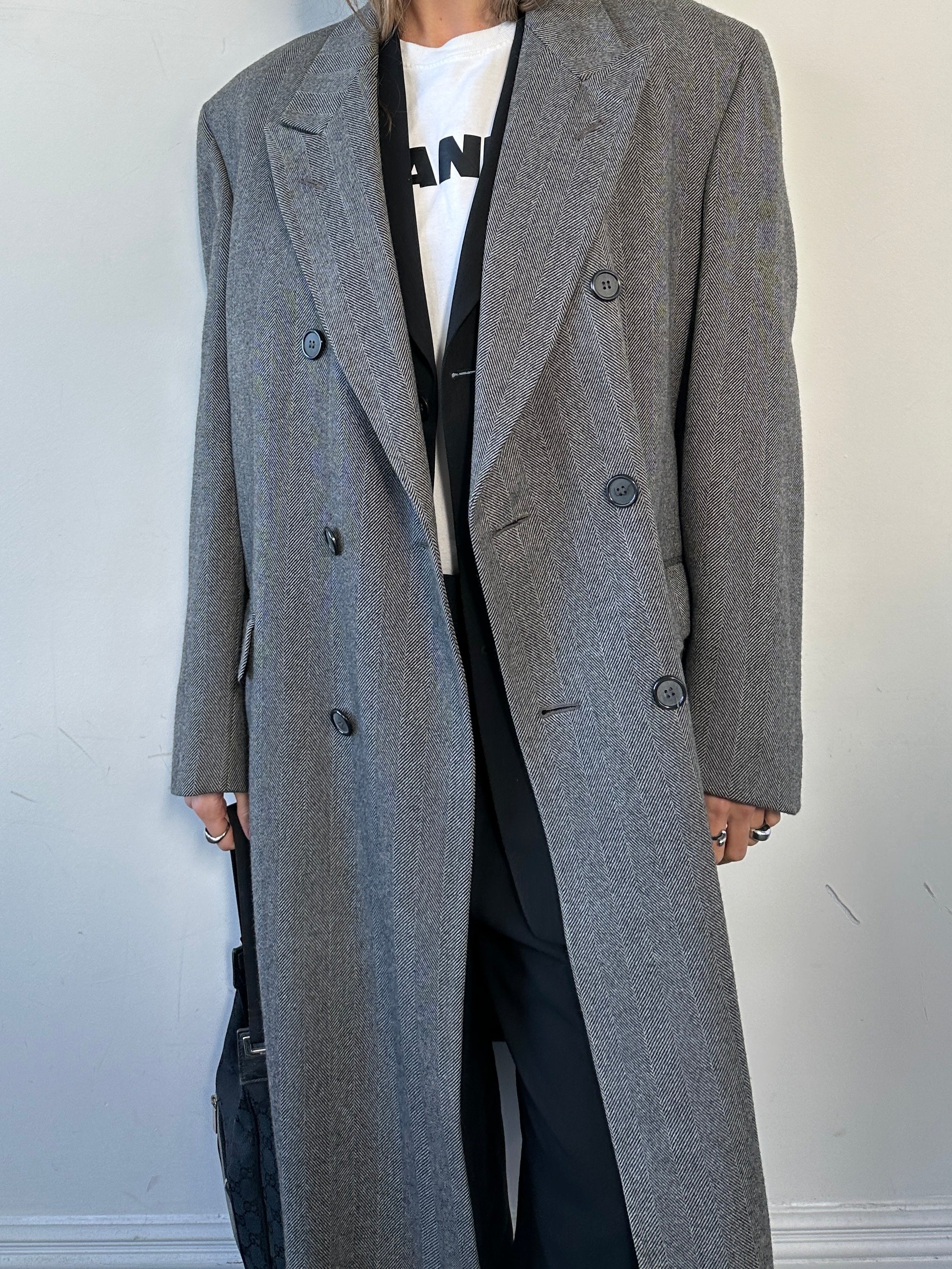 Vintage British double-breasted wool coat with herringbone pattern in size L/XL, classic vintage outerwear for cold weather.