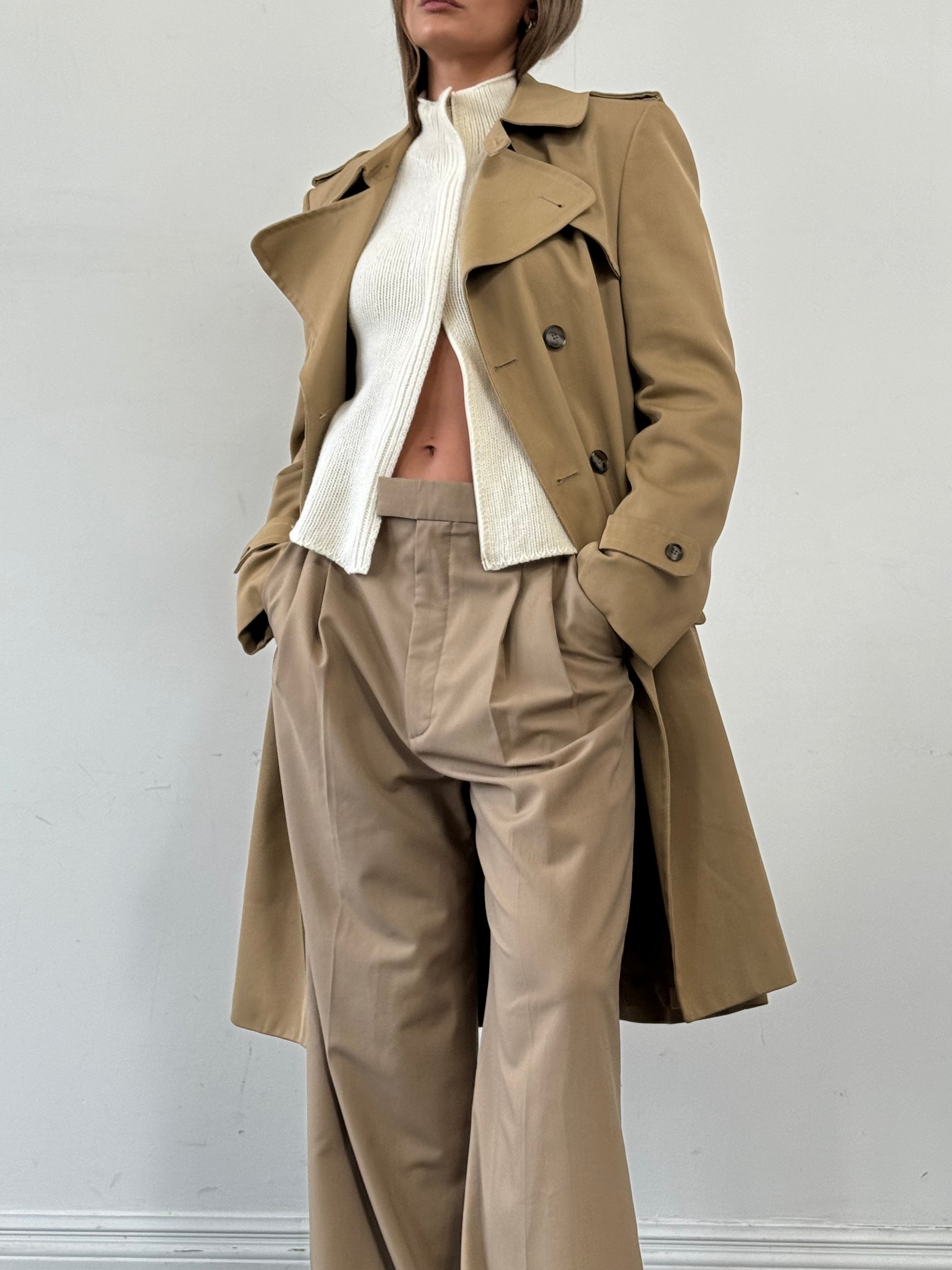 Vintage wool double-breasted trench coat in size L, classic design with button details and tailored fit, perfect for stylish outerwear.