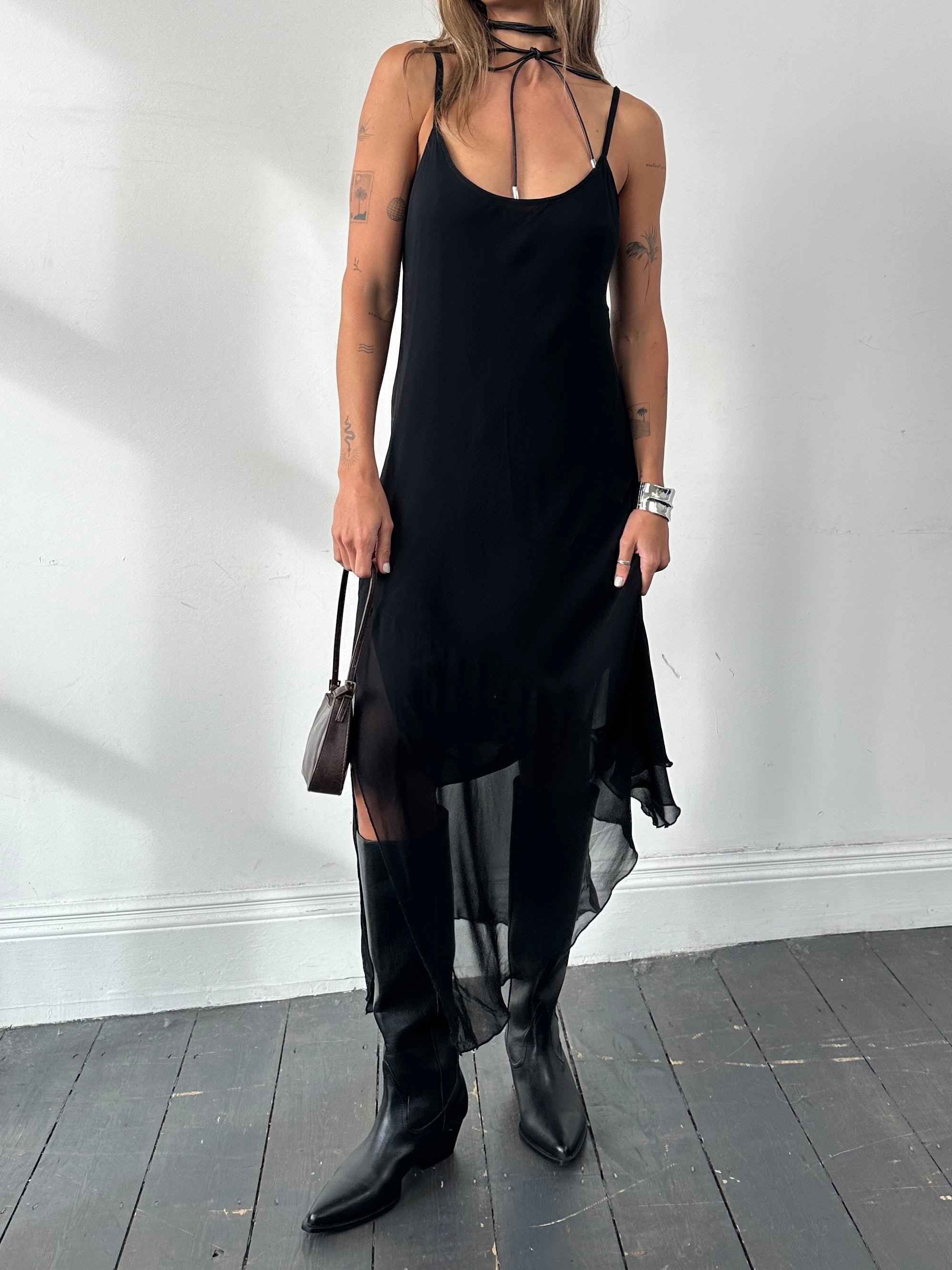Vintage Italian slip dress with split hem in size L, featuring a flowy fabric and elegant design.