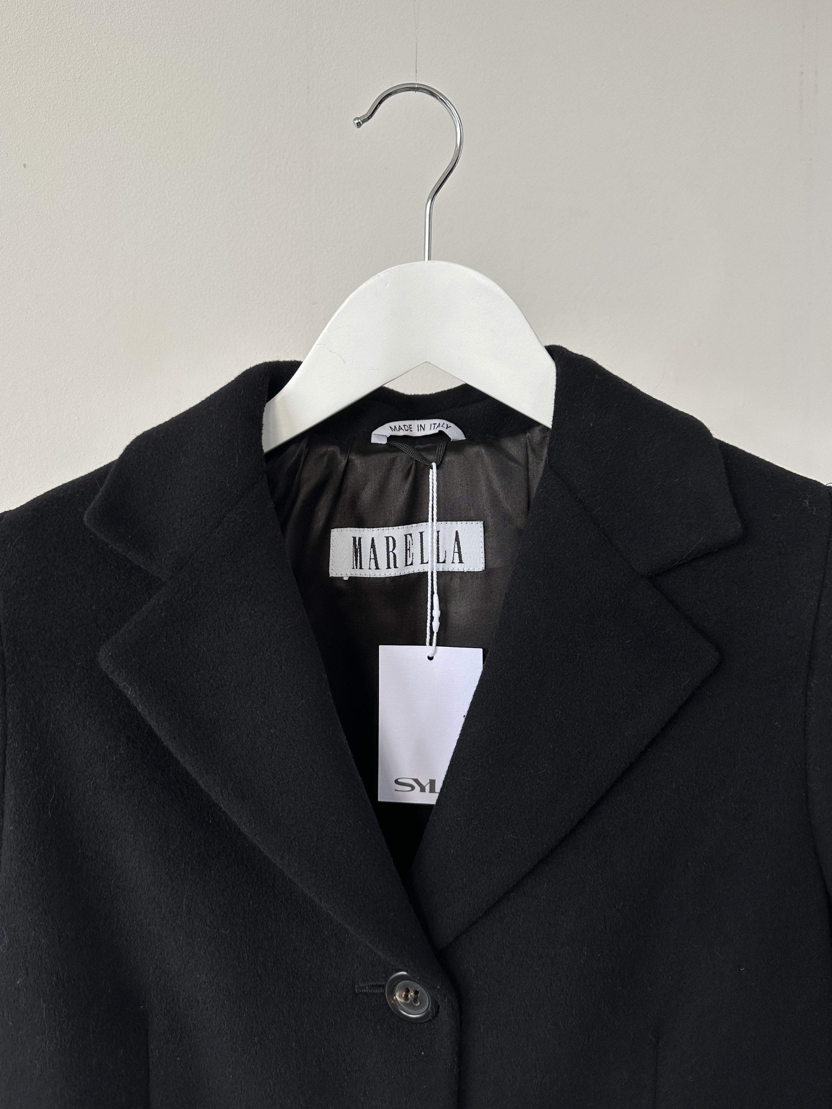Marella virgin wool single-breasted coat in XS/S hanging on a hanger, featuring a classic design and neutral color.