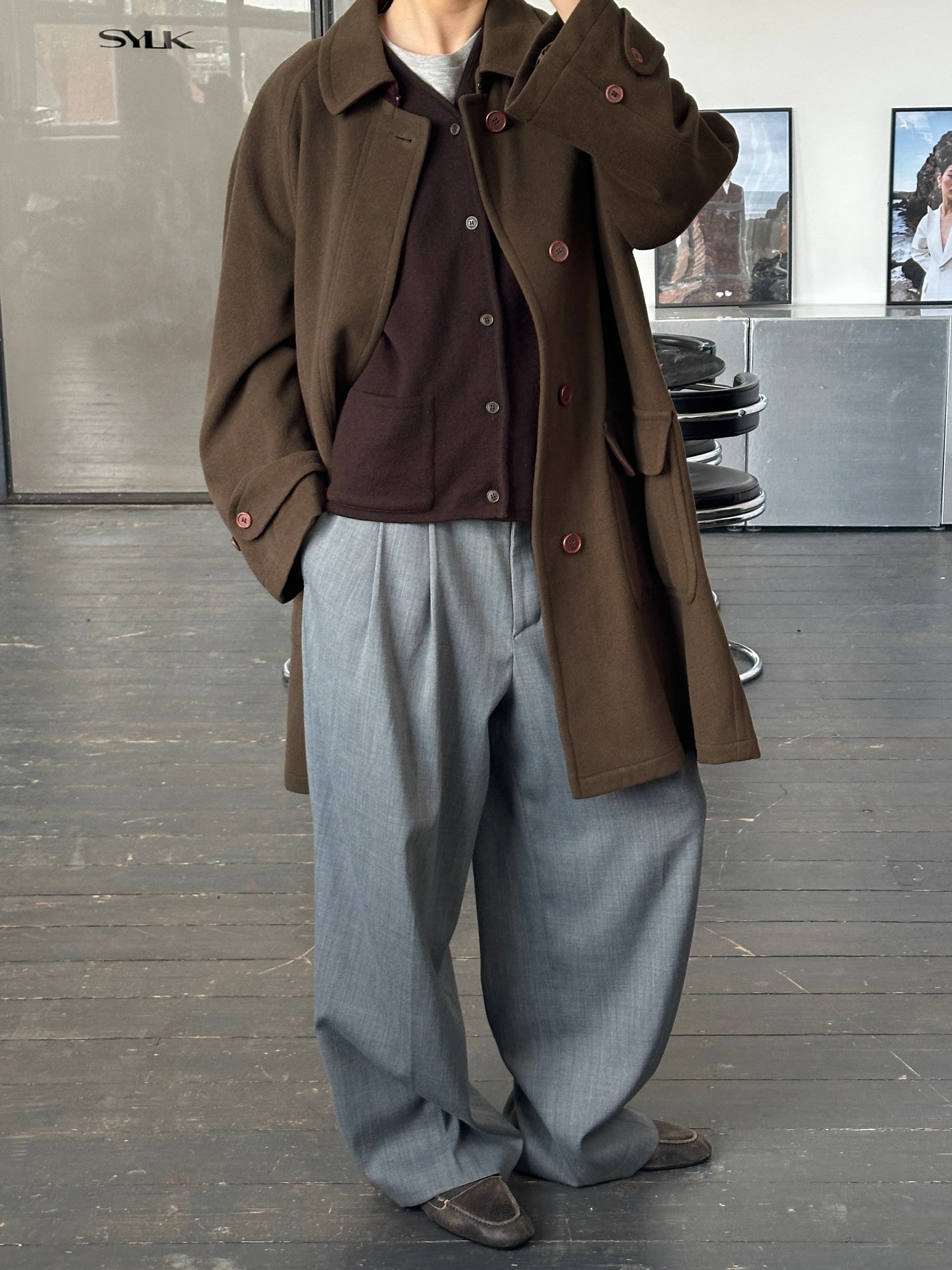Missoni 1990s wool coat with concealed placket, oversized XXL fit, featuring colorful knit pattern and classic design.